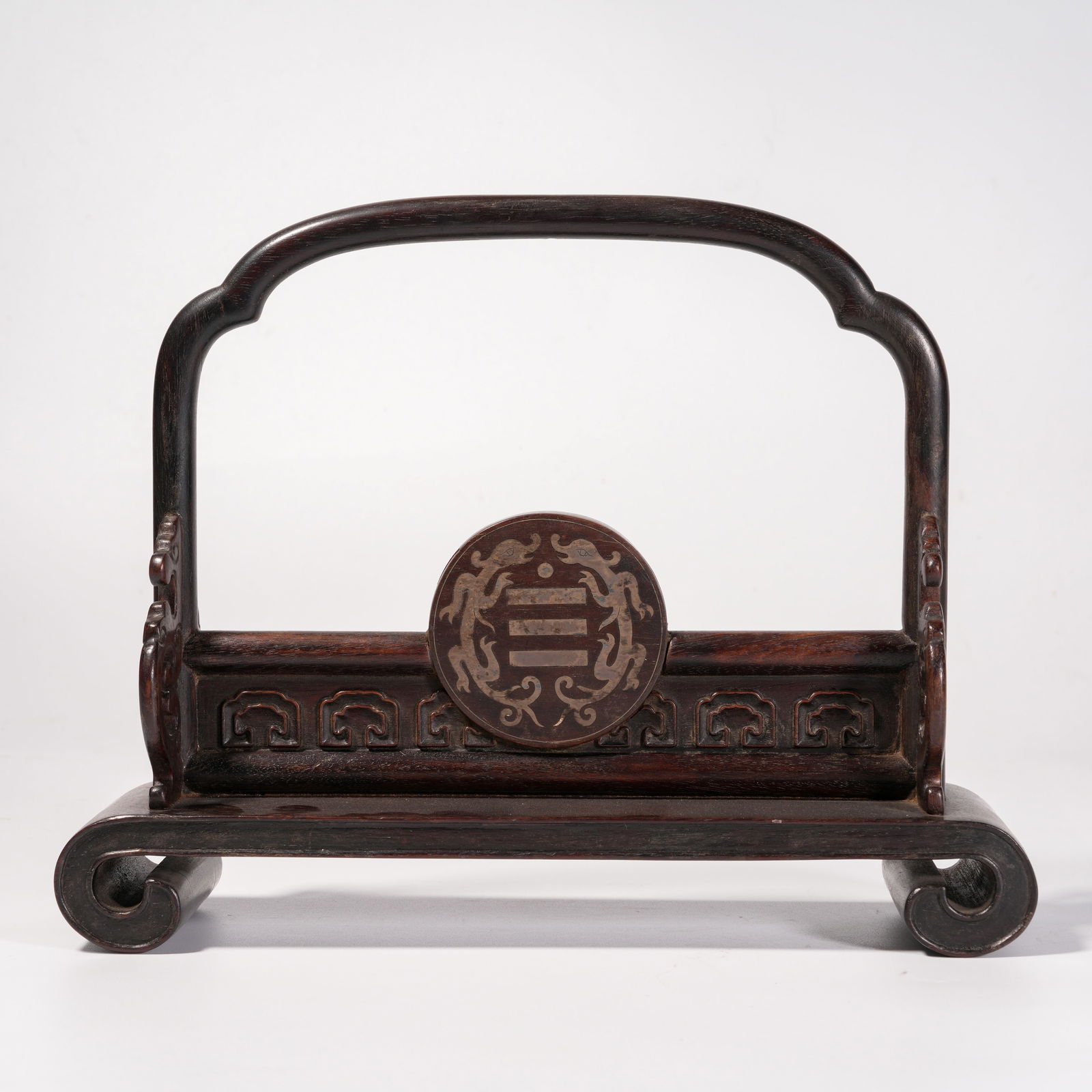 A ZITAN WOOD AND SILVER INLAID ANCIENT BI DISK STAND WITH CHI DRAGON AND BAGUA MOTIFS: Zitan Wood and Silver Inlaid Ancient Bi Disk Stand with Chi Dragon and Bagua Motifs