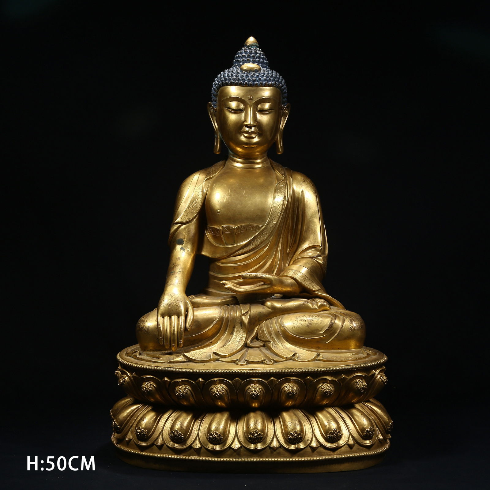 A GILT BRONZE SHAKYAMUNI BUDDHA STATUE: Gilt Bronze Shakyamuni Buddha Statue
