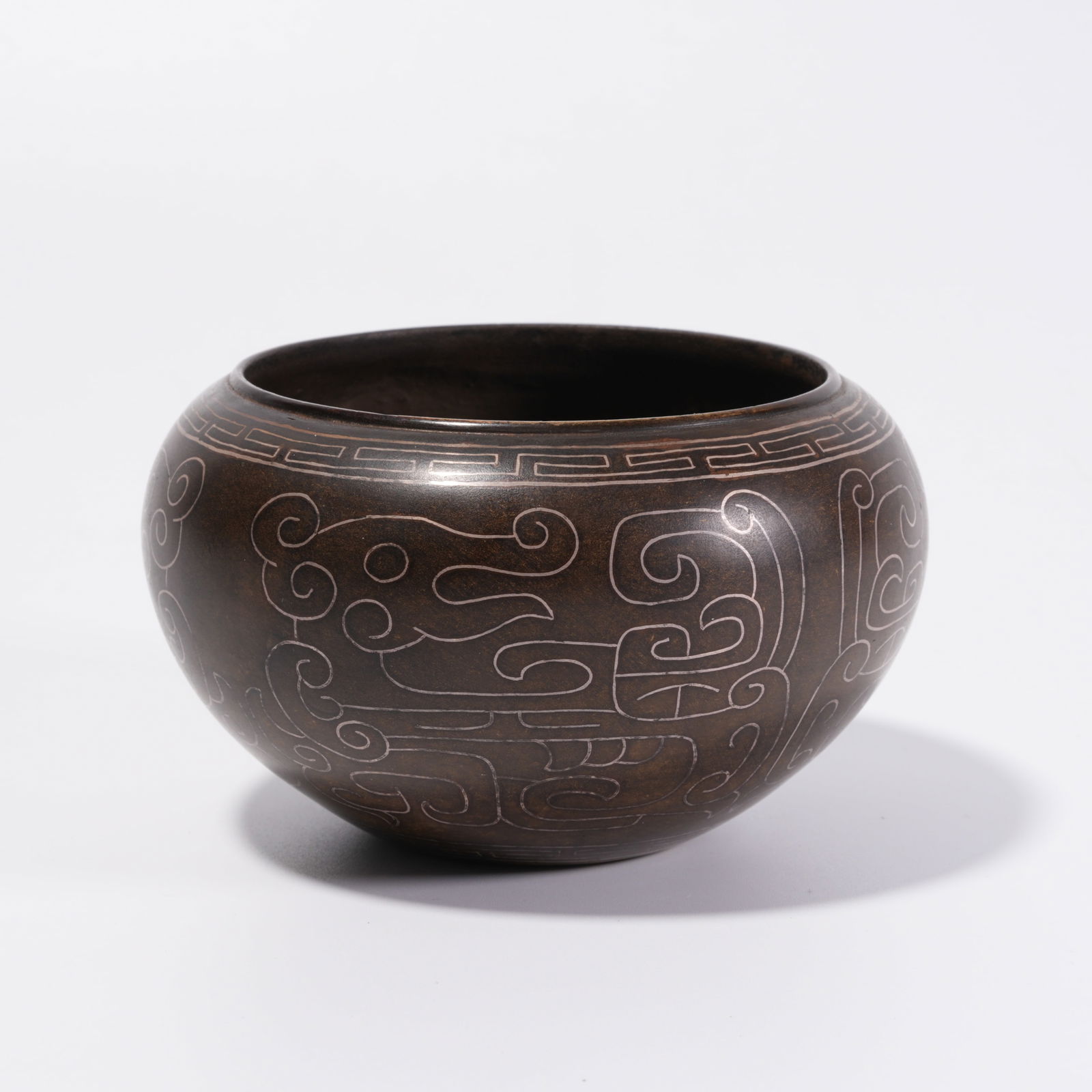 A BRONZE INLAID SILVER WATER VESSEL: Bronze Inlaid Silver Water Vessel