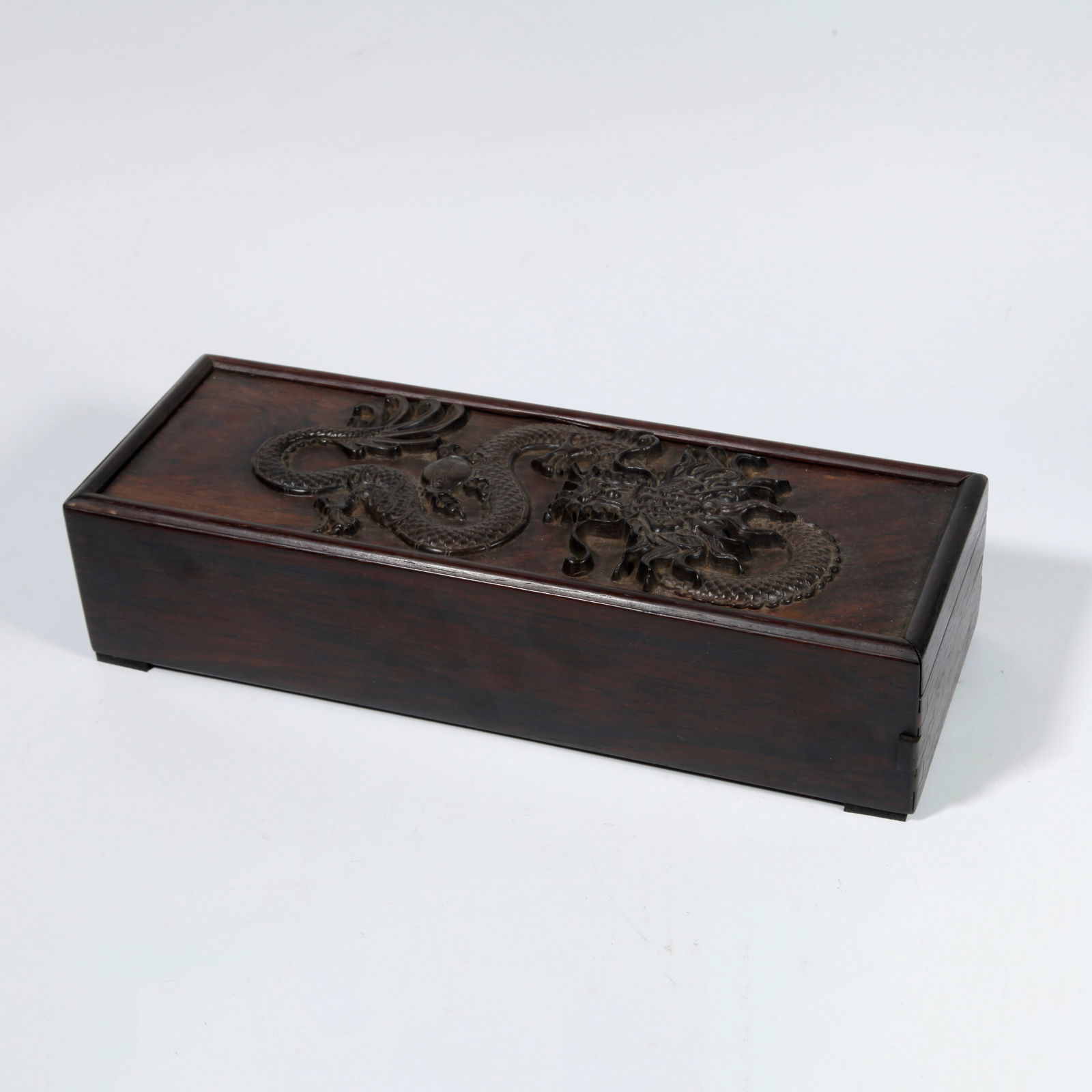 A ZITAN WOOD BOX WITH CHI DRAGON CARVED LID: Zitan Wood Box with Chi Dragon Carved Lid