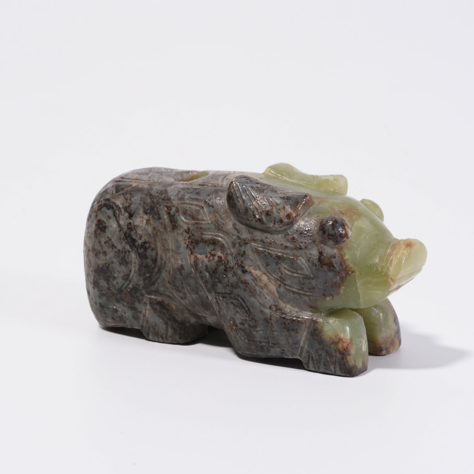 A HETIAN YELLOW JADE BEAST-SHAPED PENDANT: Hetian Yellow Jade Beast-Shaped Pendant