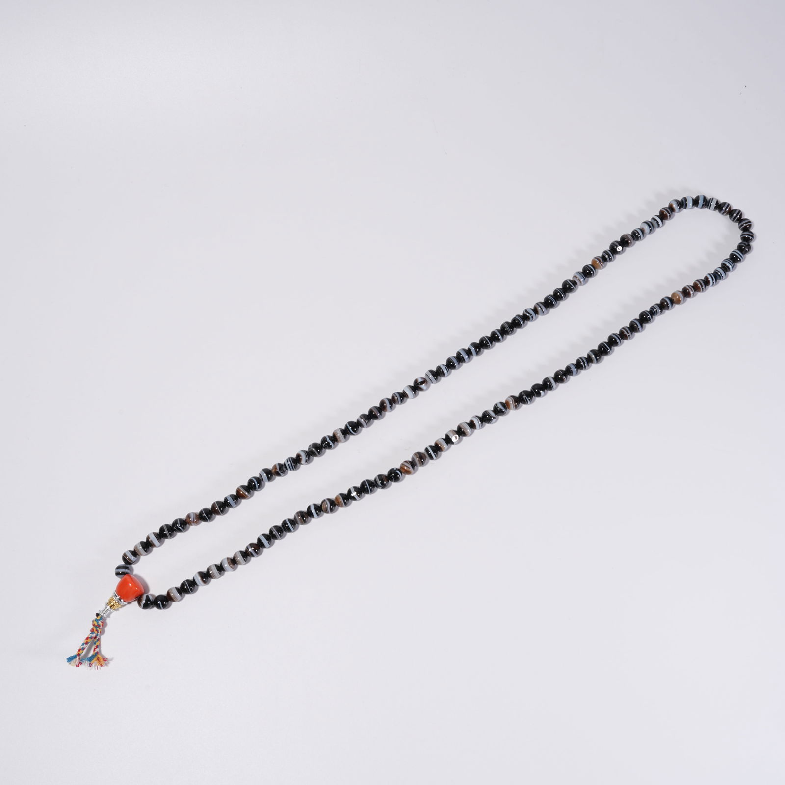 A YAKUSHI TIANZHU HANDHELD BEAD: Yakushi Tianzhu Handheld Bead