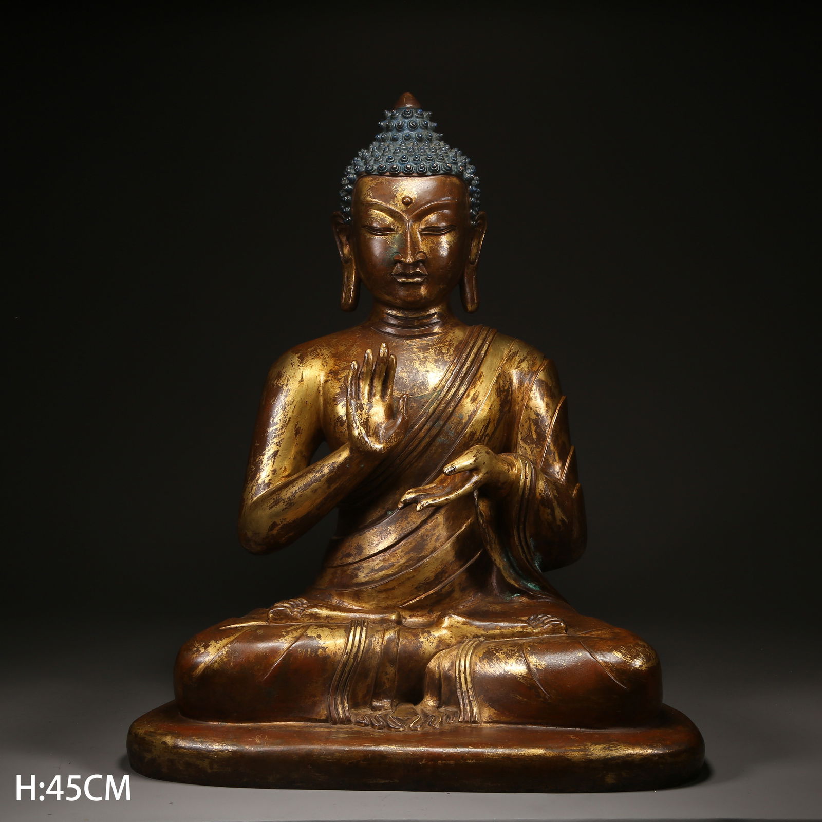 A GILT BRONZE AMOGHASIDDHI BUDDHA STATUE: Gilt Bronze Amoghasiddhi Buddha Statue