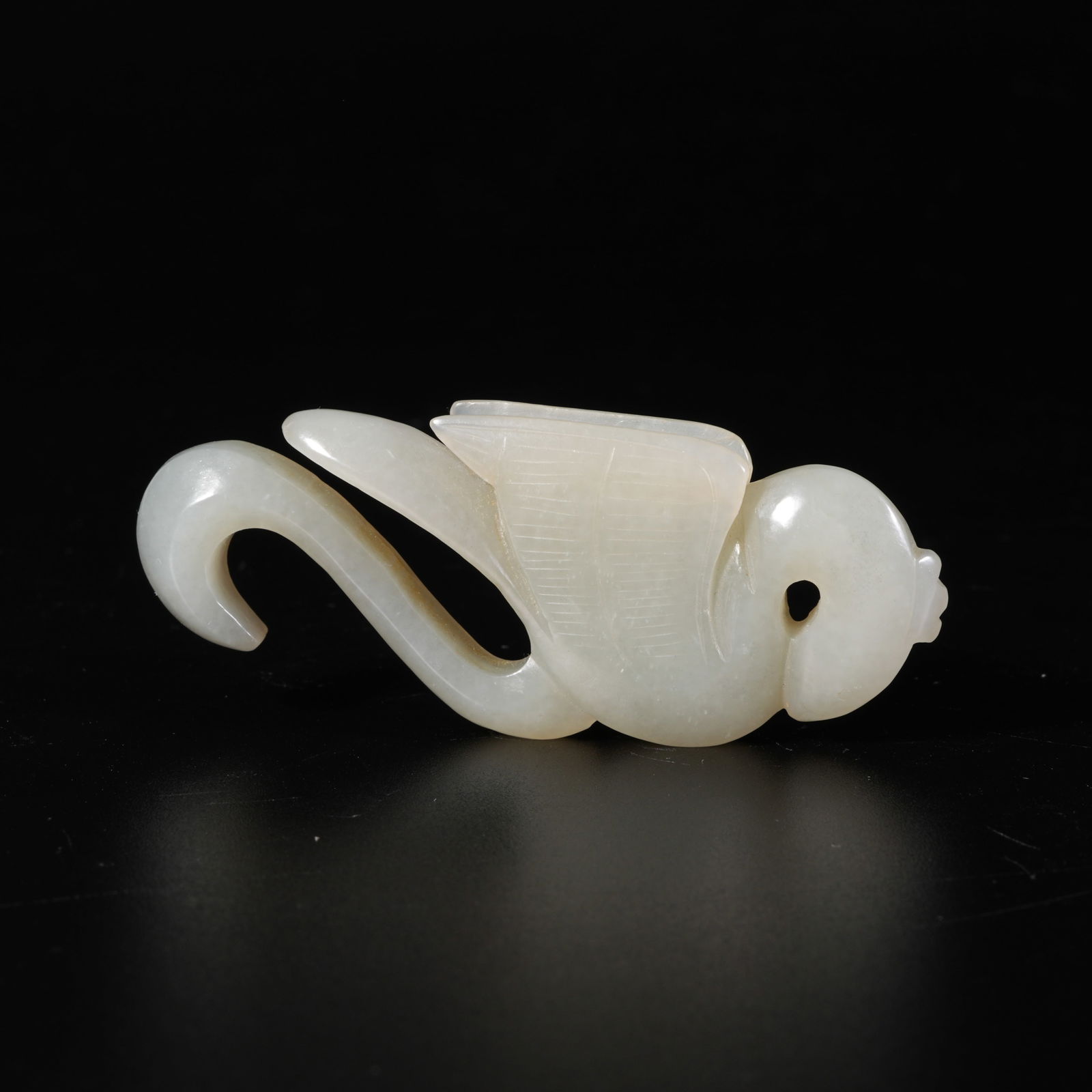 A HETIAN JADE BEAST-PATTERN PENDANT (1 of 10)