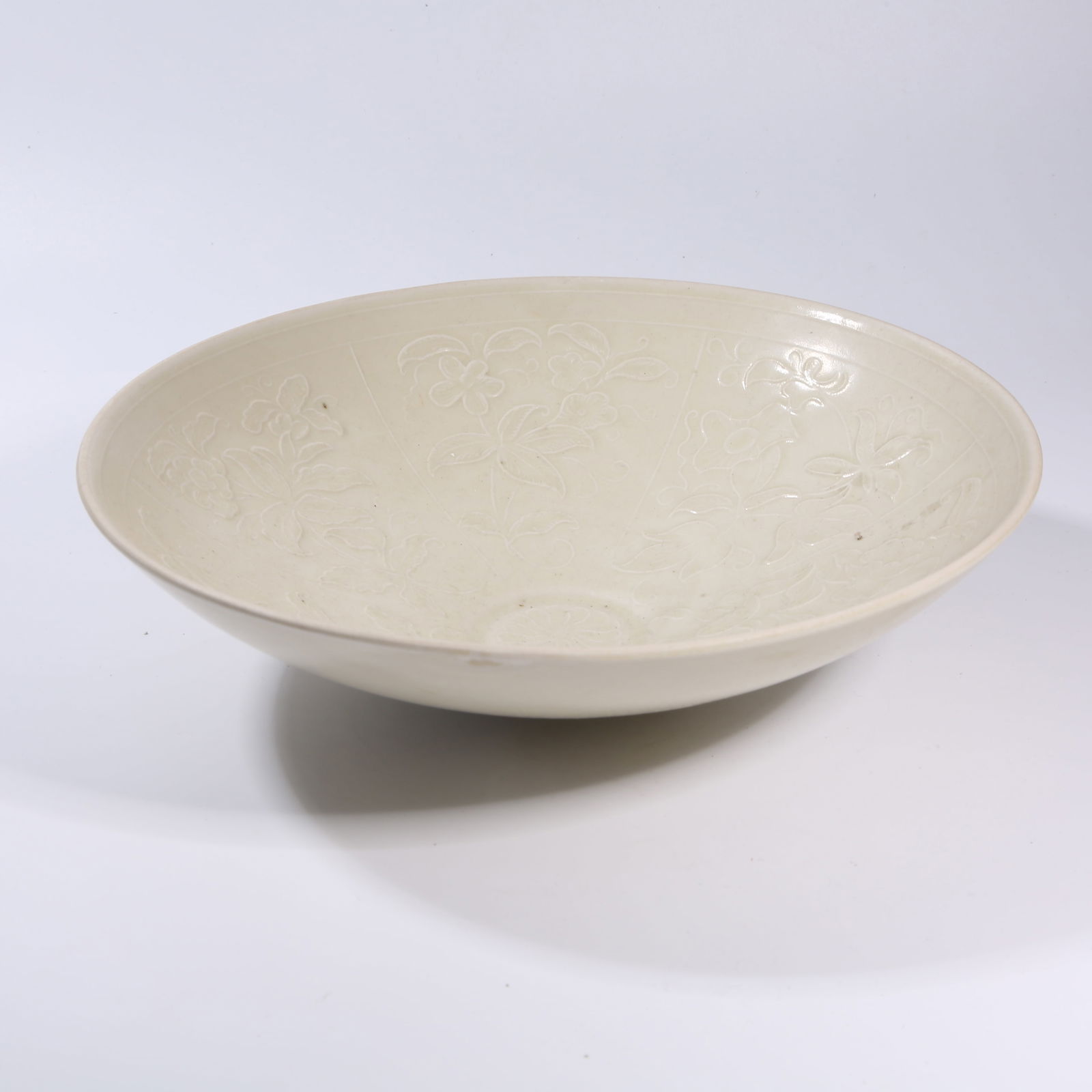 A DING KILN CARVED FLORAL PATTERNED DISH (1 of 7)