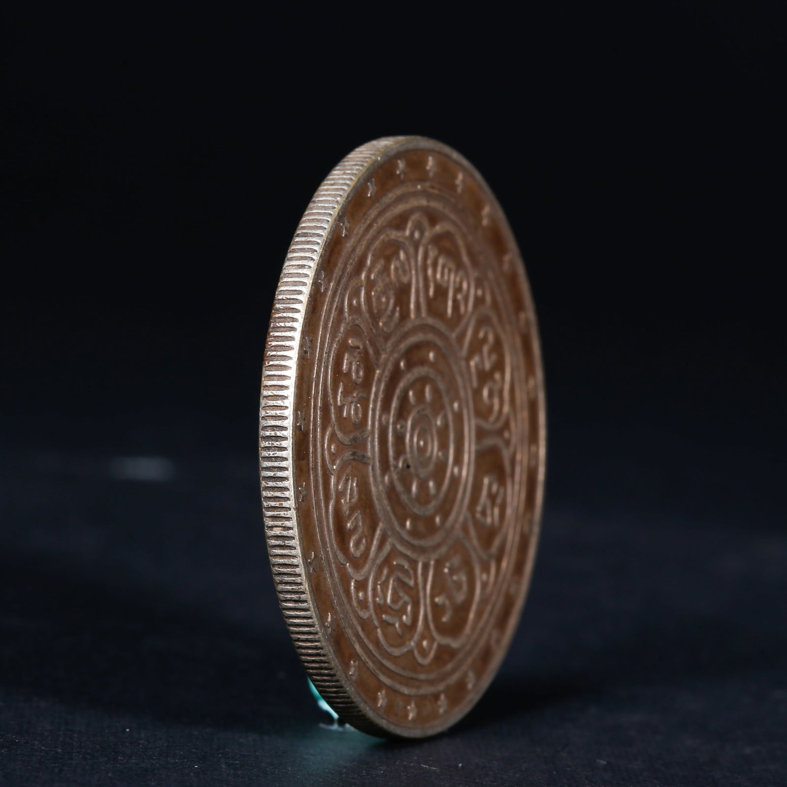 A SILVER DOLLAR COIN - 3