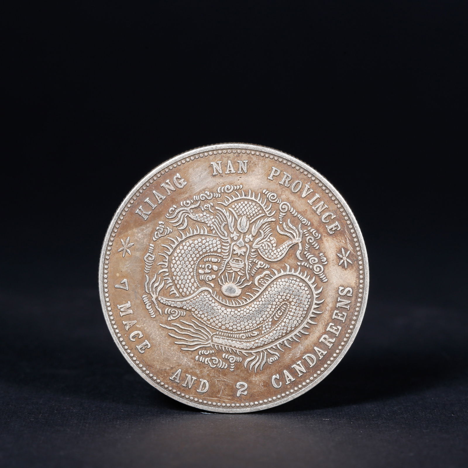 A SILVER DOLLAR COIN - 2