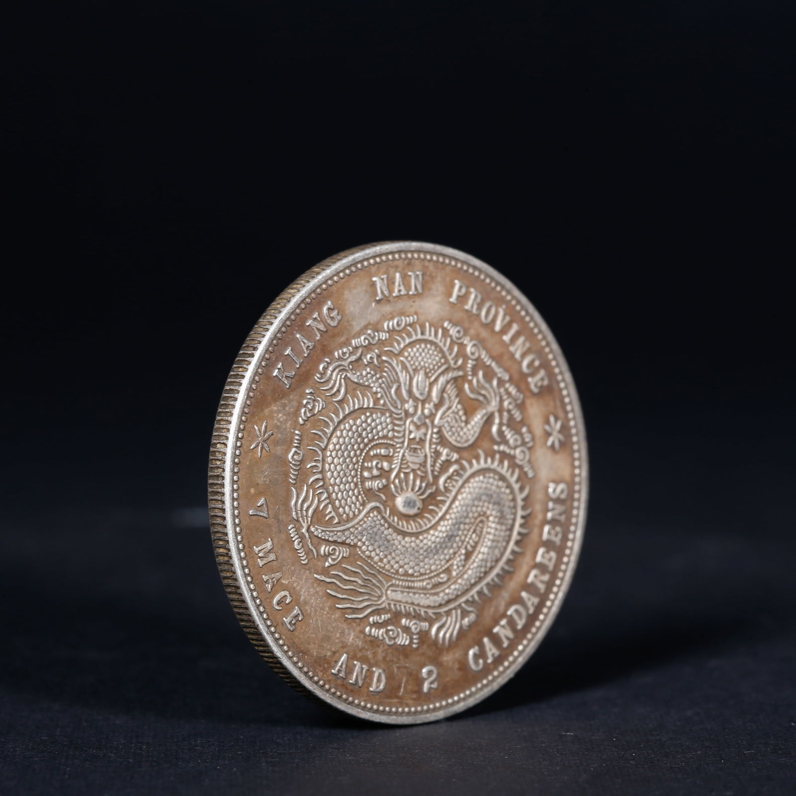 A SILVER DOLLAR COIN - 3