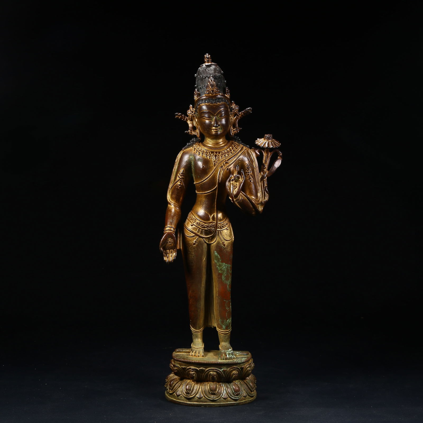 A GILT BRONZE STANDING AVALOKITESHVARA WITH LOTUS IN HAND (1 of 8)