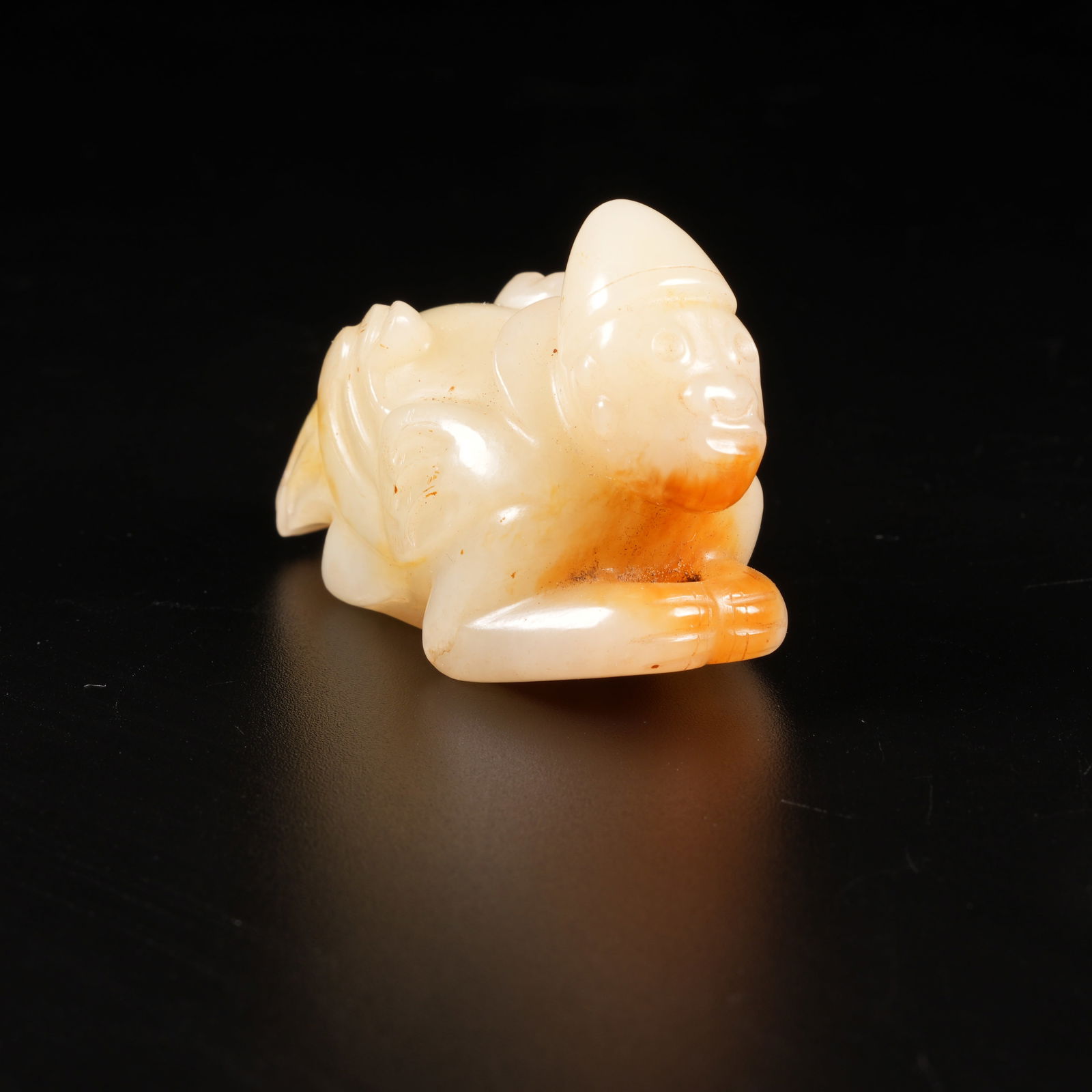 A ANCIENT JADE FEATHERED IMMORTAL ORNAMENT: Ancient Jade Feathered Immortal Ornament