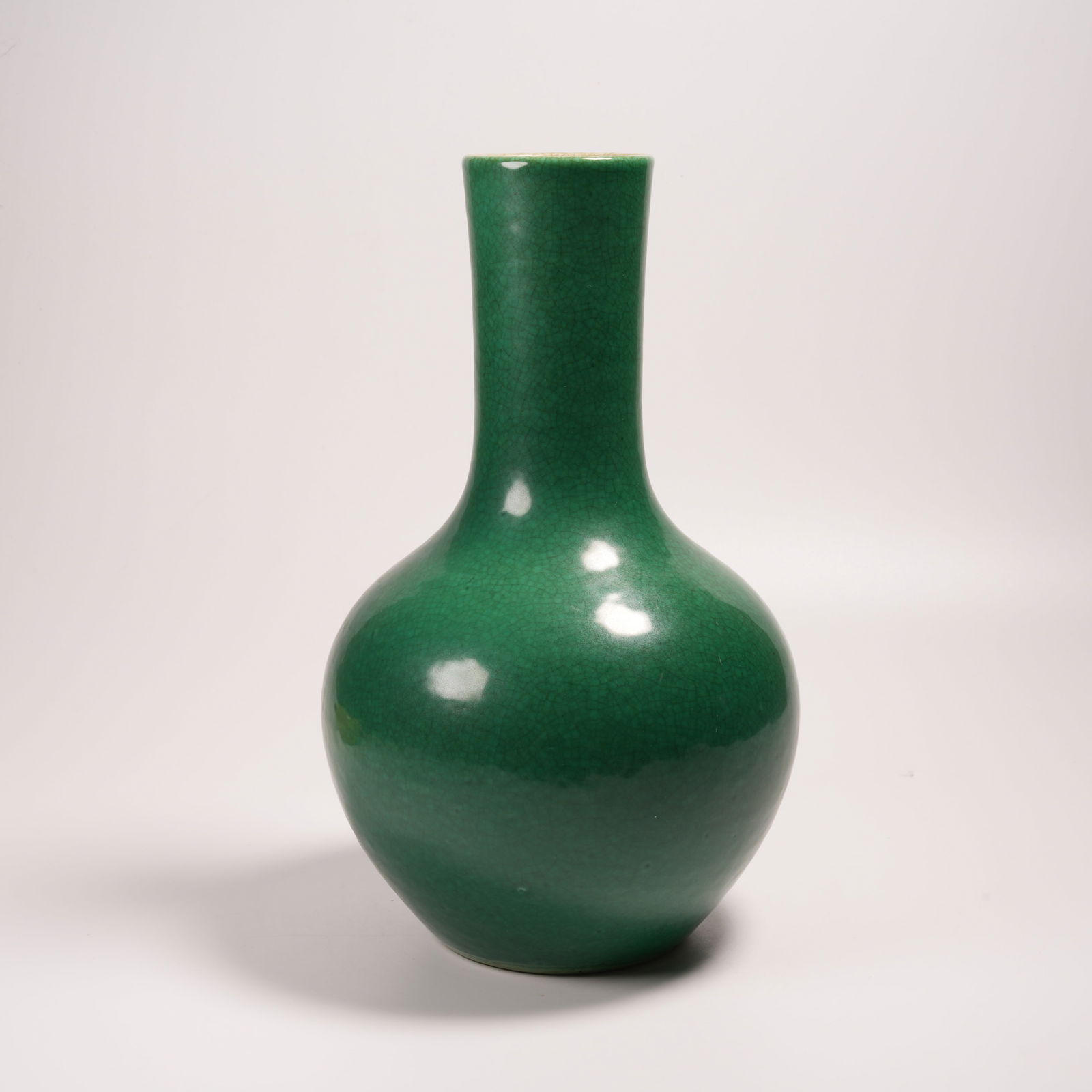 A PEACOCK GREEN GLAZE LONG-NECK VASE: Peacock Green Glaze Long-Neck Vase