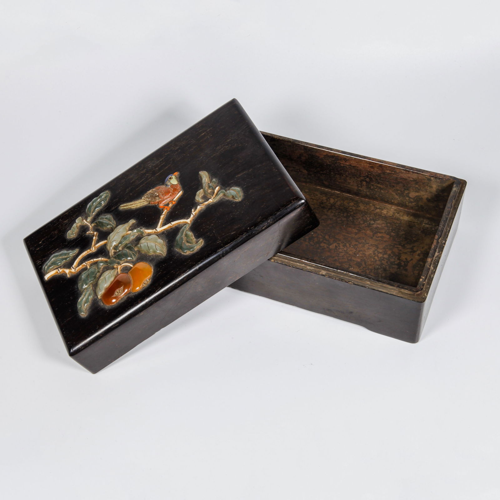 A ZITAN WOOD CARVED INLAID PRECIOUS STONE FLOWER AND BIRD PATTERN COVERED BOX: Zitan Wood Carved Inlaid Precious Stone Flower and Bird Pattern Covered Box