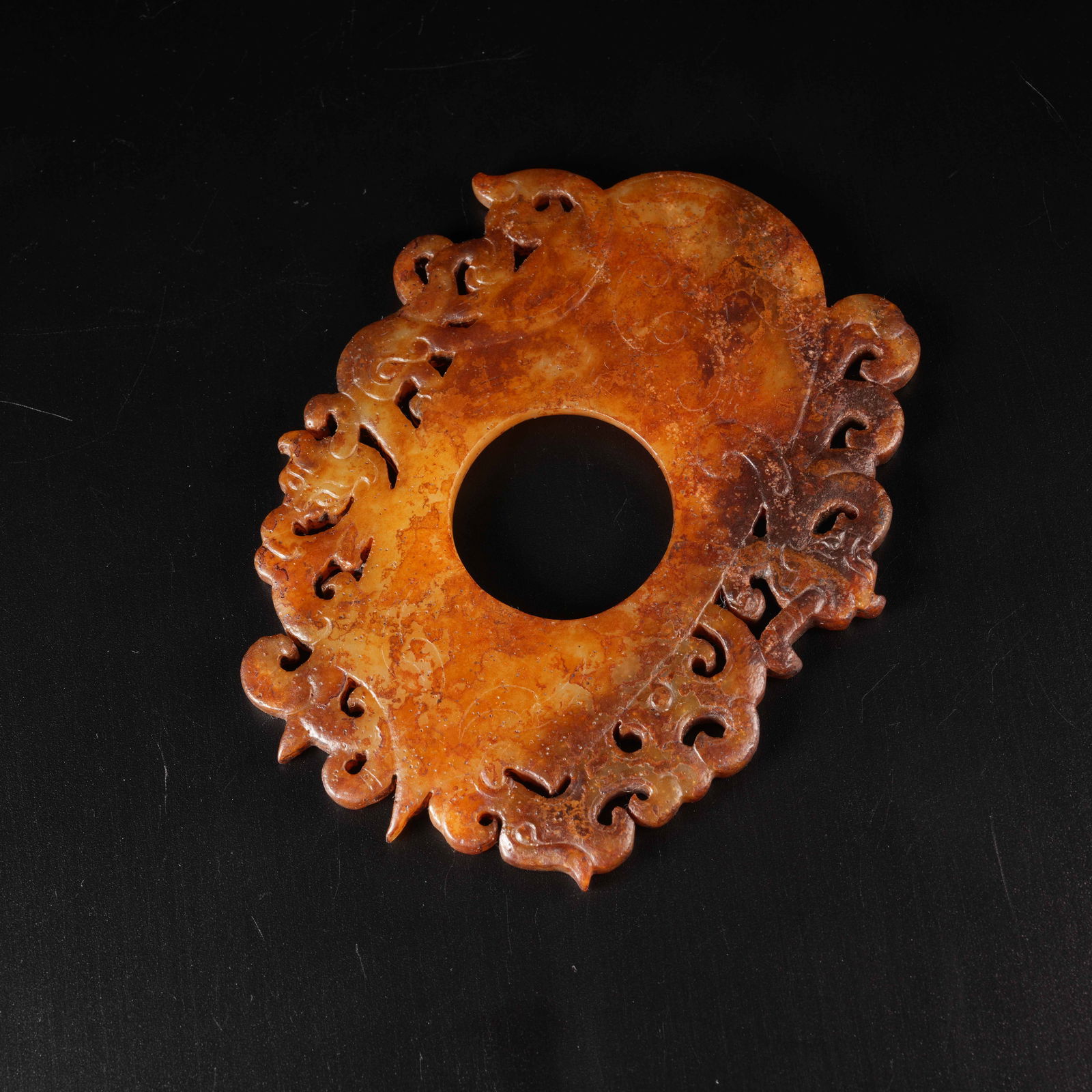 A CHI-DRAGON MOTIF CHICKEN-HEART PENDANT IN ARCHAIC JADE: Chi-Dragon Motif Chicken-Heart Pendant in Archaic Jade