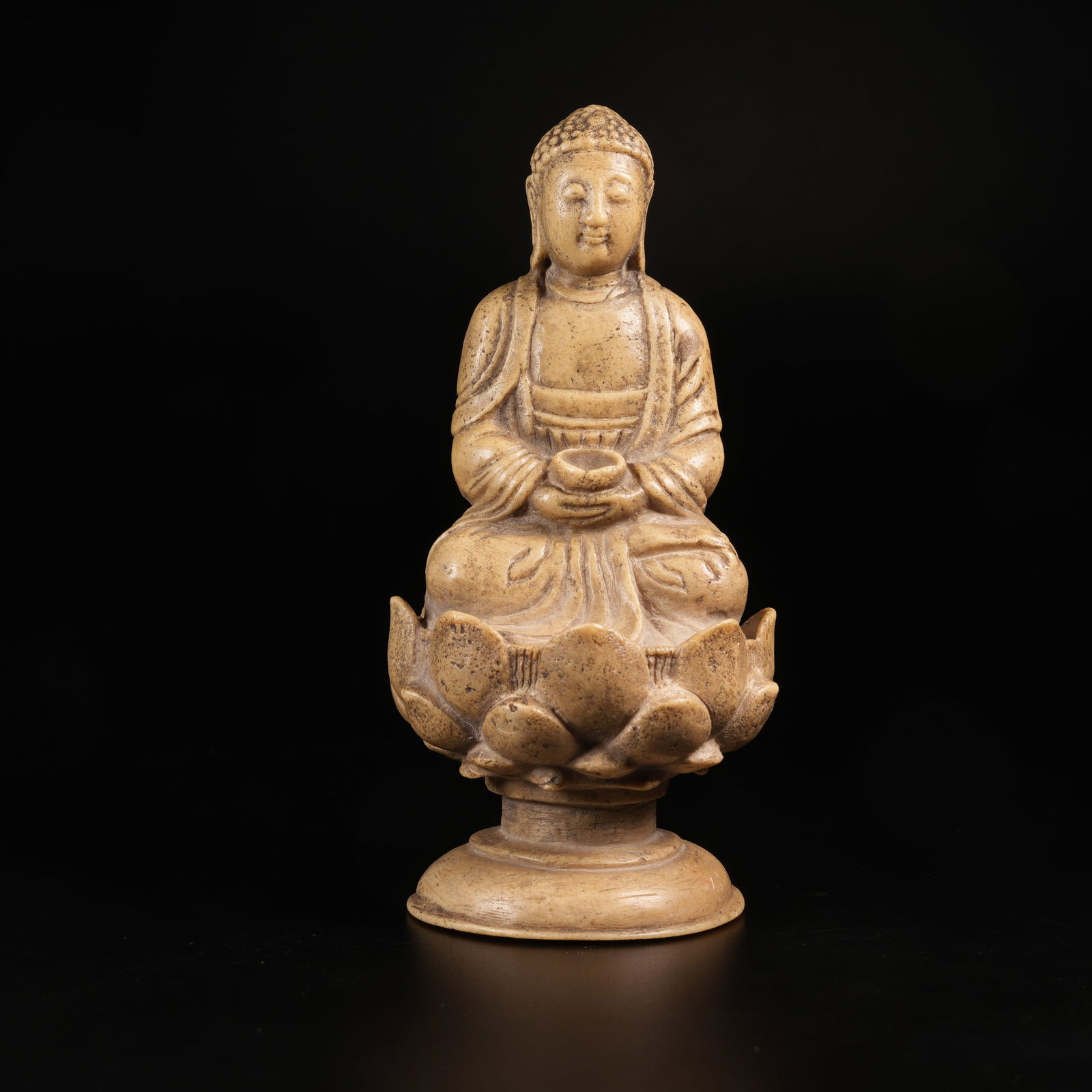 A SEATED SHAKYAMUNI IN SHOUSHAN STONE: Seated Shakyamuni in Shoushan Stone