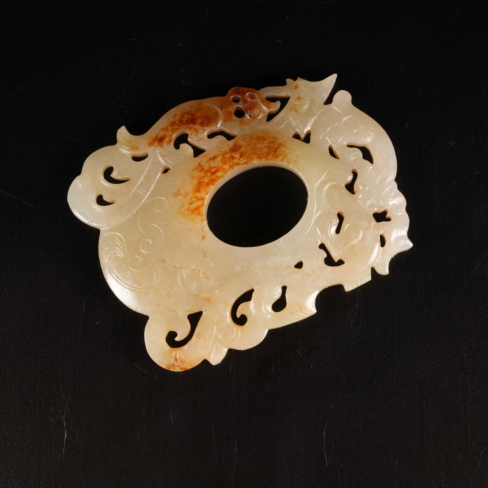 A CHI-DRAGON MOTIF CHICKEN-HEART PENDANT IN ARCHAIC JADE: Chi-Dragon Motif Chicken-Heart Pendant in Archaic Jade