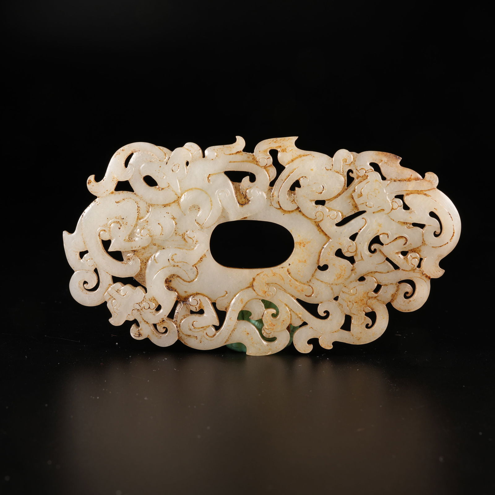 A CHI-DRAGON MOTIF CHICKEN-HEART PENDANT IN ARCHAIC JADE (1 of 7)