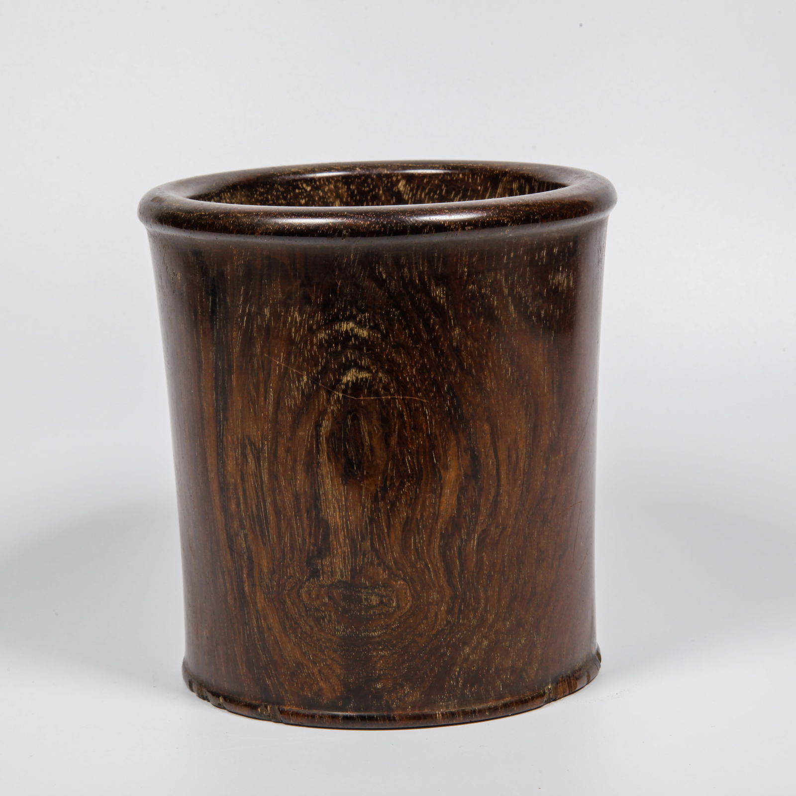 A HUANGHUALI WOOD CARVED BRUSH HOLDER: Huanghuali Wood Carved Brush Holder