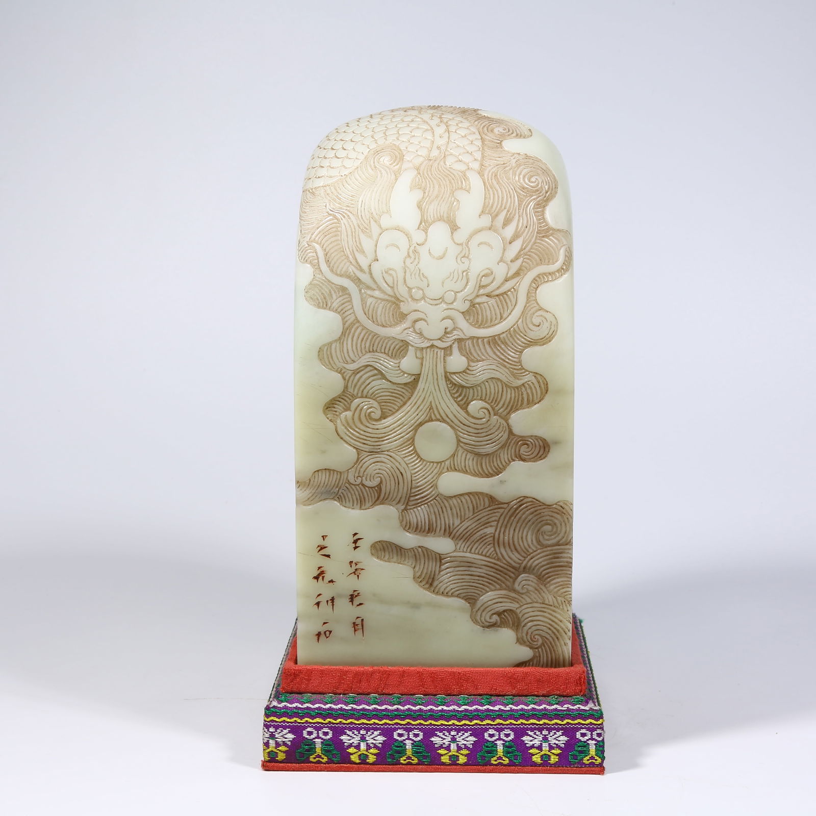A LARGE SHOUSHAN FURONG STONE SEAL WITH CLOUD AND DRAGON PATTERN: Large Shoushan Furong stone seal with cloud and dragon pattern