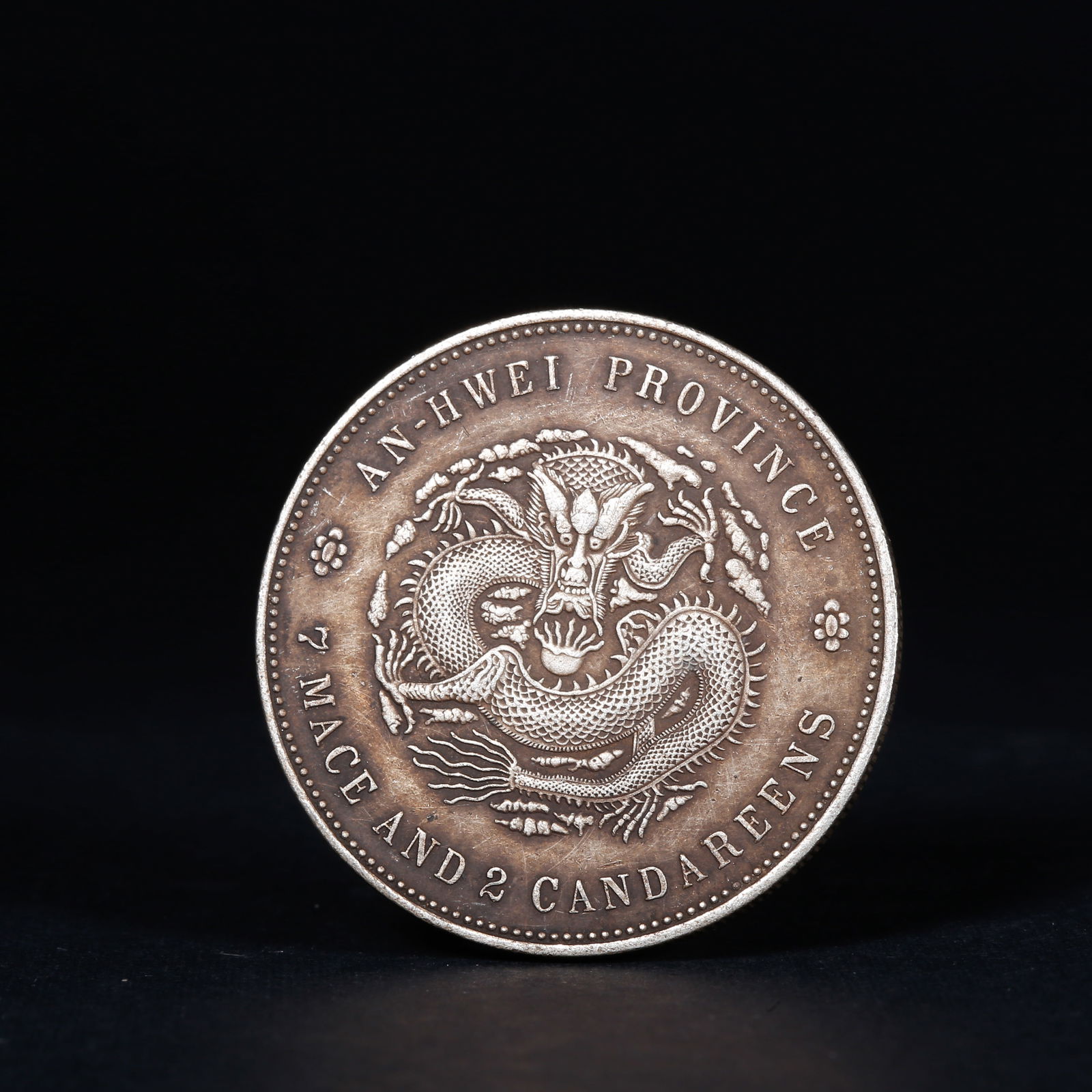 A SILVER DOLLAR COIN - 2