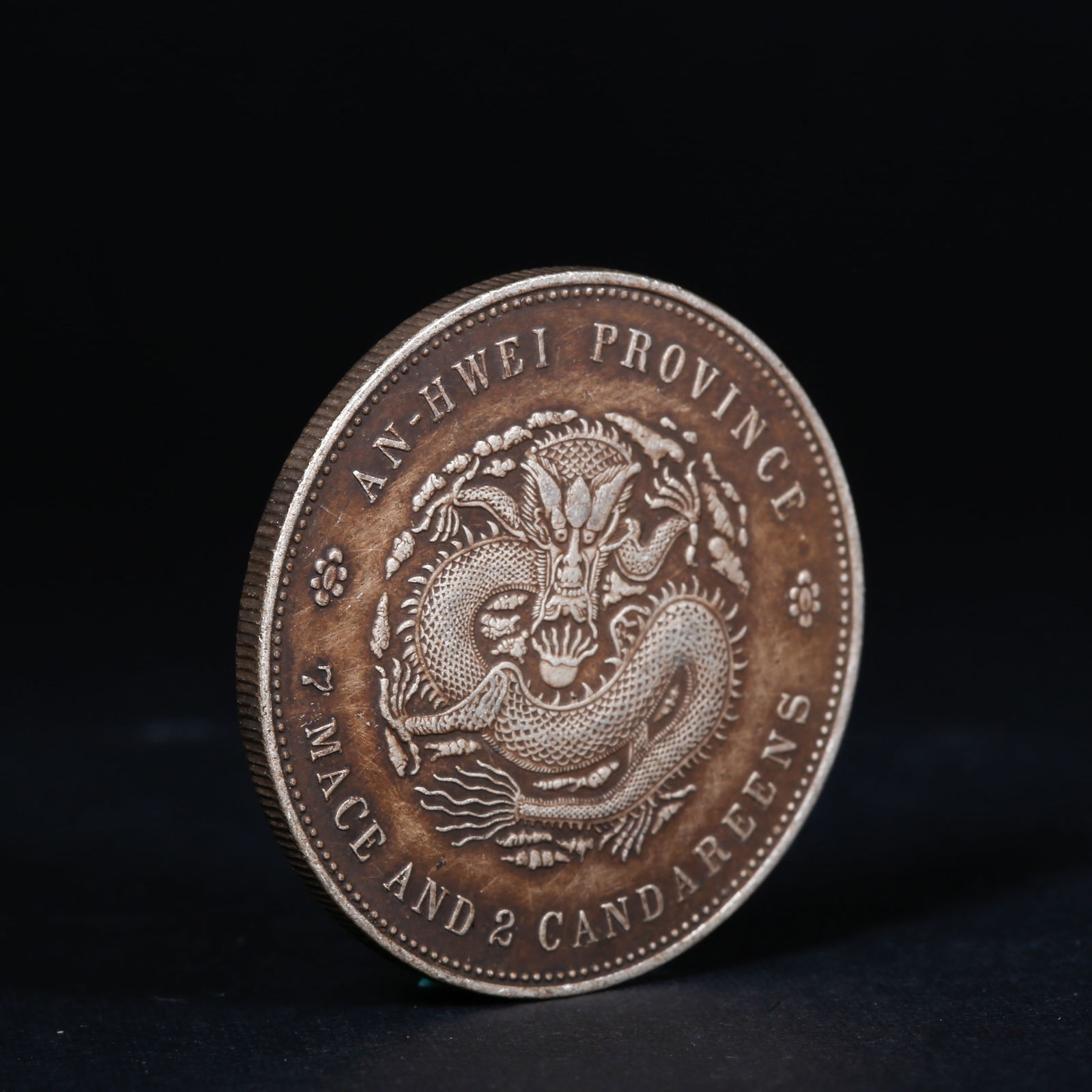 A SILVER DOLLAR COIN - 3