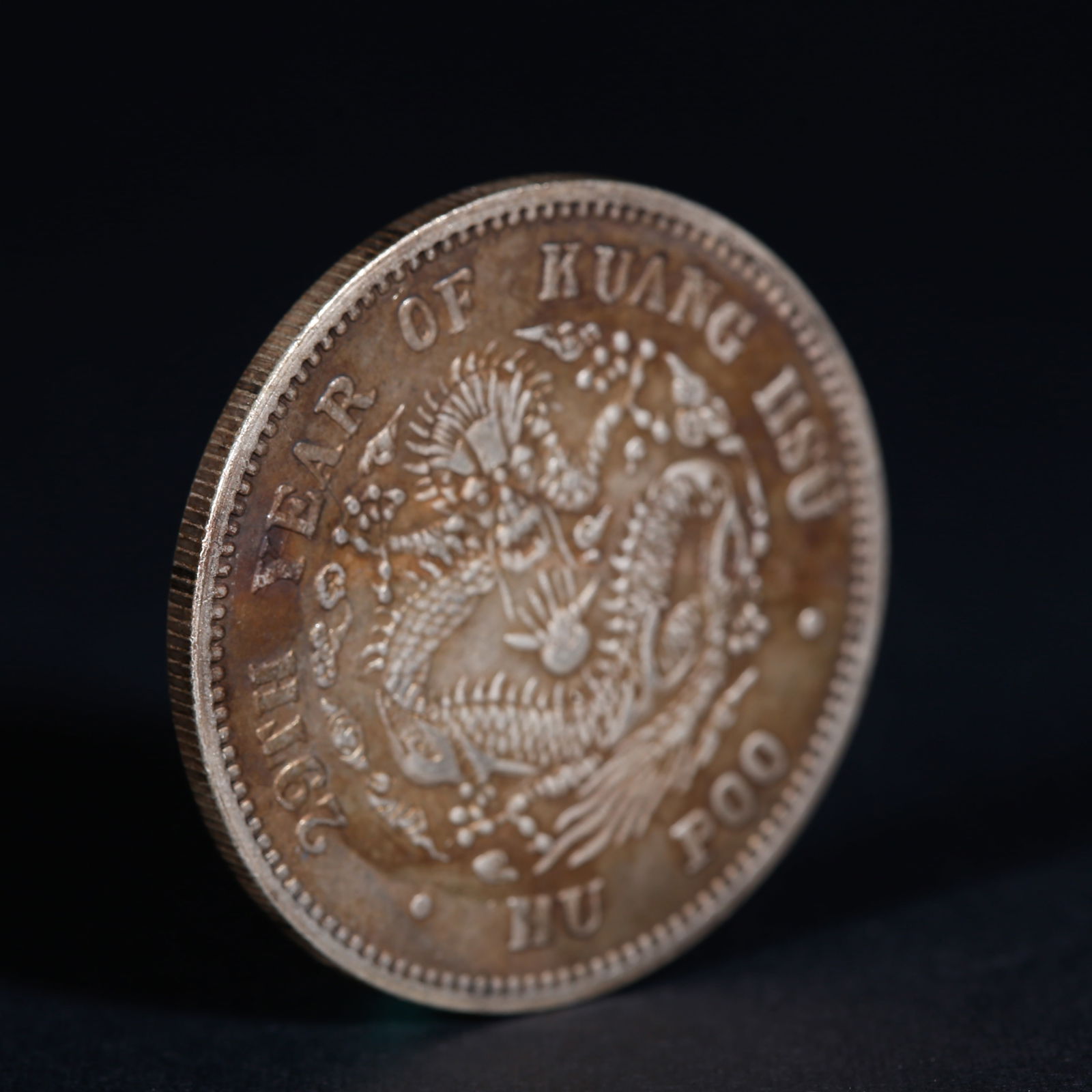 A SILVER DOLLAR COIN - 3