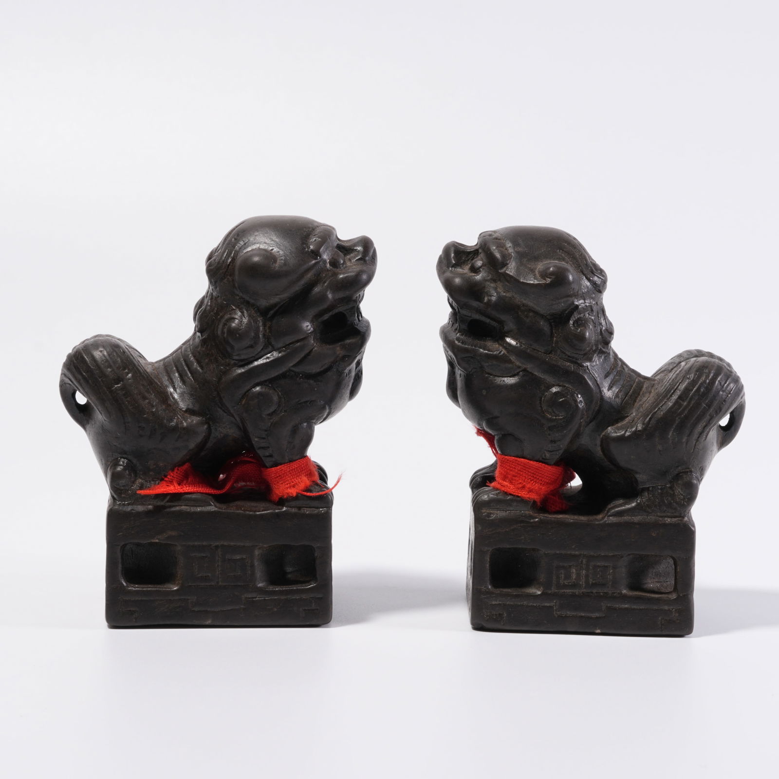 A STONE LION ORNAMENTS (PAIR): Stone Lion Ornaments (Pair)