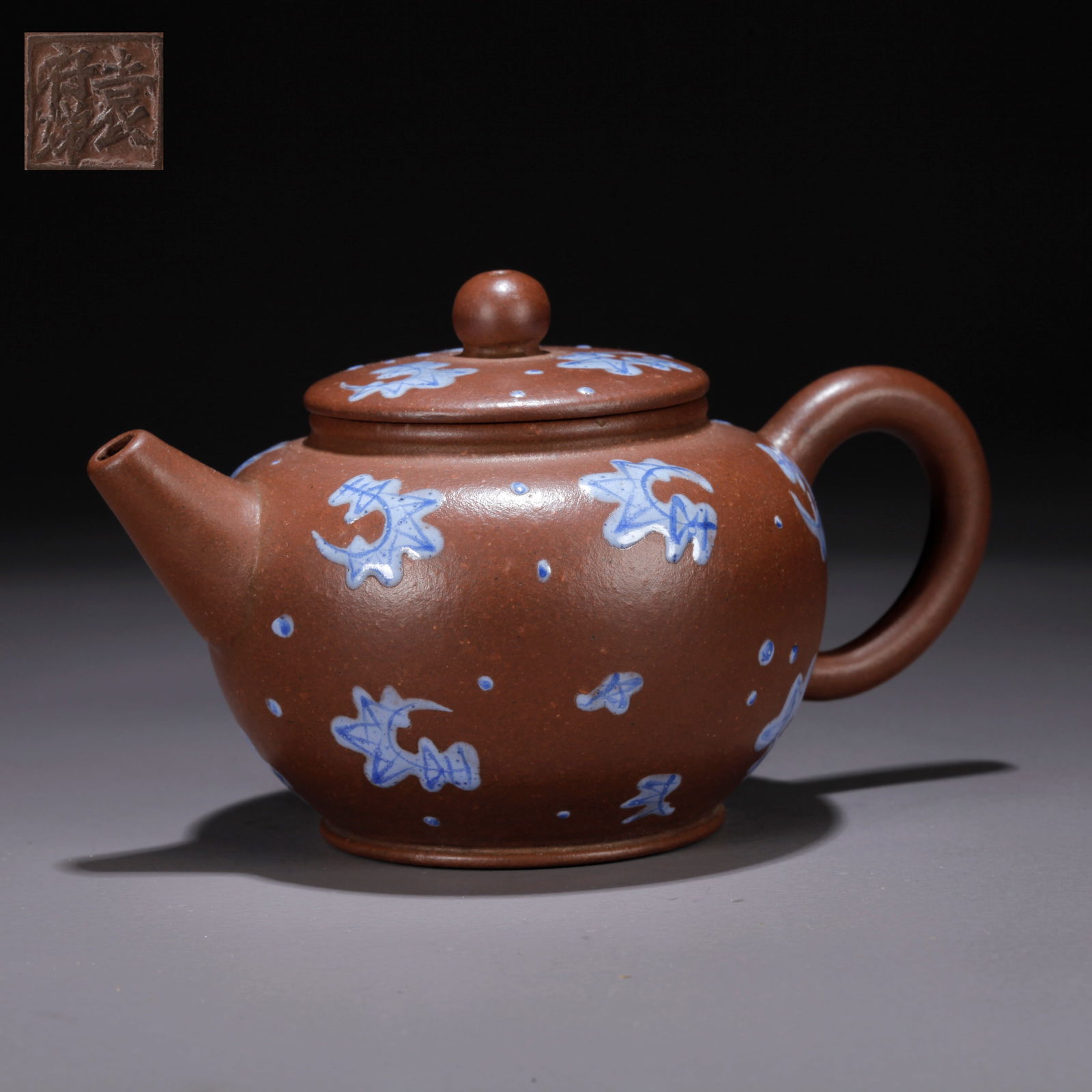 A PURPLE CLAY (ZISHA) TEAPOT (1 of 9)