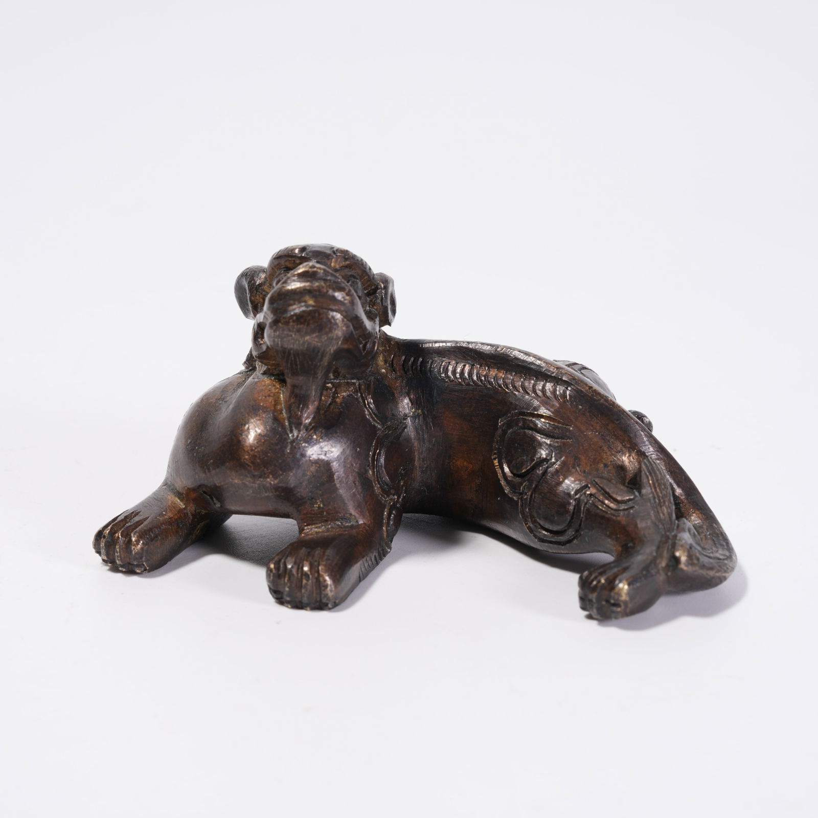 A BRONZE BEAST ORNAMENT: Bronze Beast Ornament