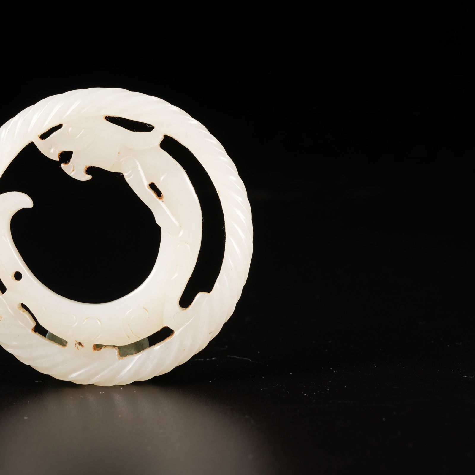 A ANCIENT JADE TWISTED-WIRE PHOENIX RING - 6