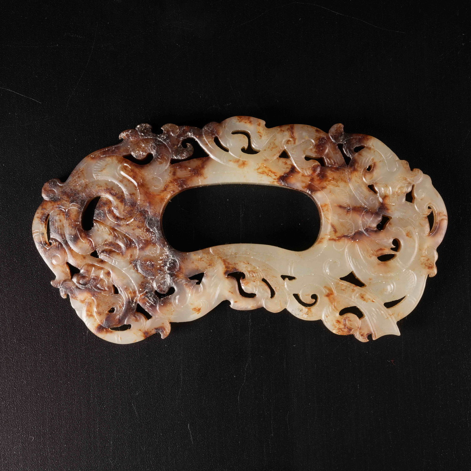 A CHI-DRAGON MOTIF CHICKEN-HEART PENDANT IN ARCHAIC JADE: Chi-Dragon Motif Chicken-Heart Pendant in Archaic Jade