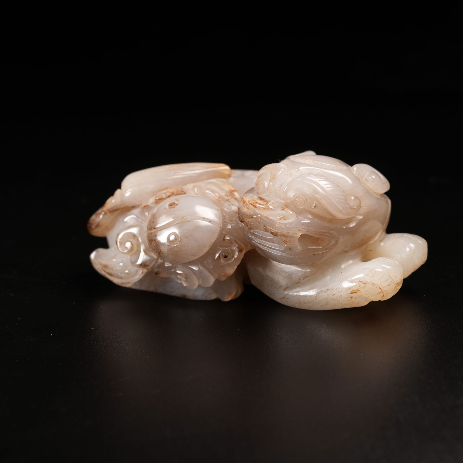 A BEAST ORNAMENT IN ARCHAIC JADE: Beast Ornament in Archaic Jade