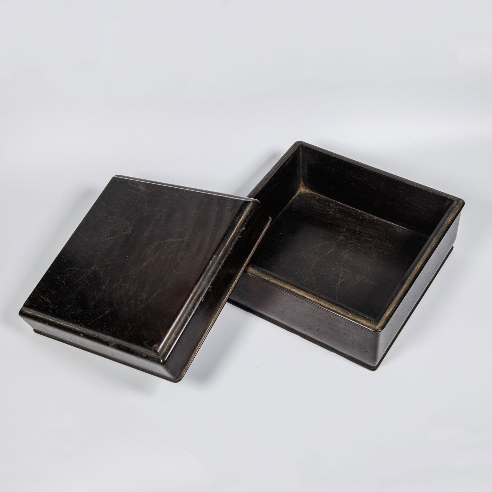 A ZITAN WOOD CARVED COVERED BOX: Zitan Wood Carved Covered Box