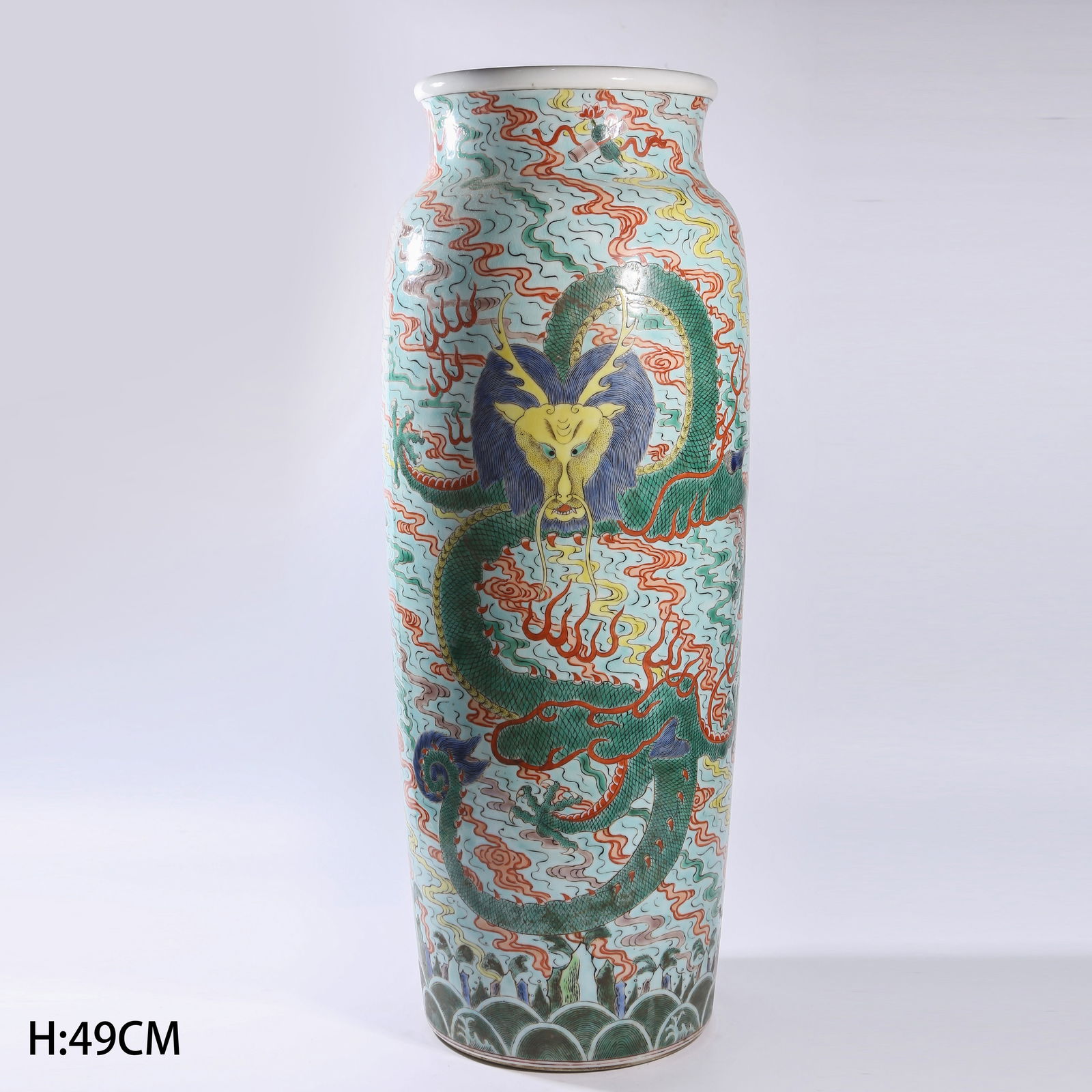 A WUCAI SEA-DRAGON PATTERNED CYLINDRICAL VASE: Wucai sea-dragon patterned cylindrical vase