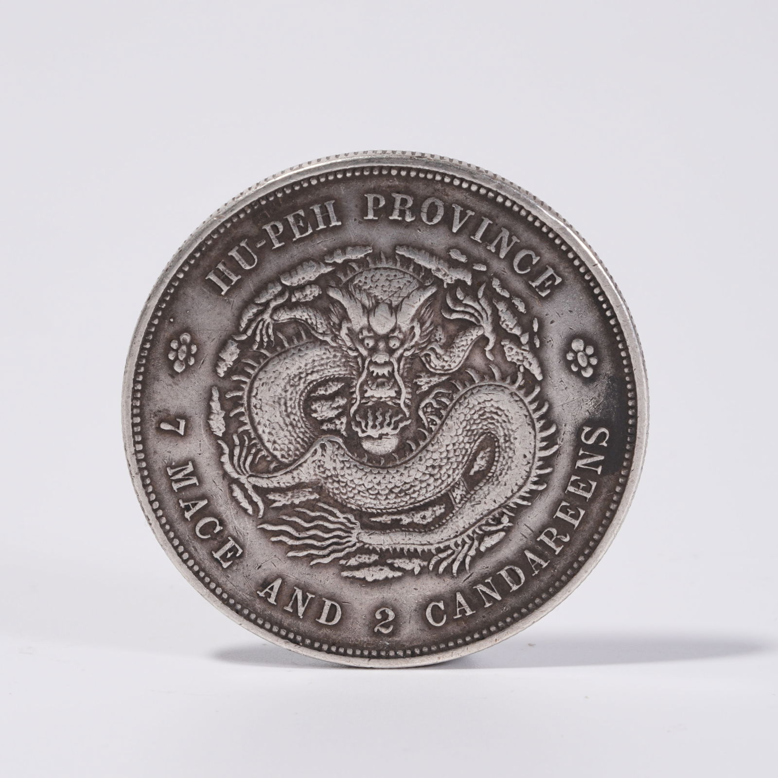 A SILVER DOLLAR COIN - 3