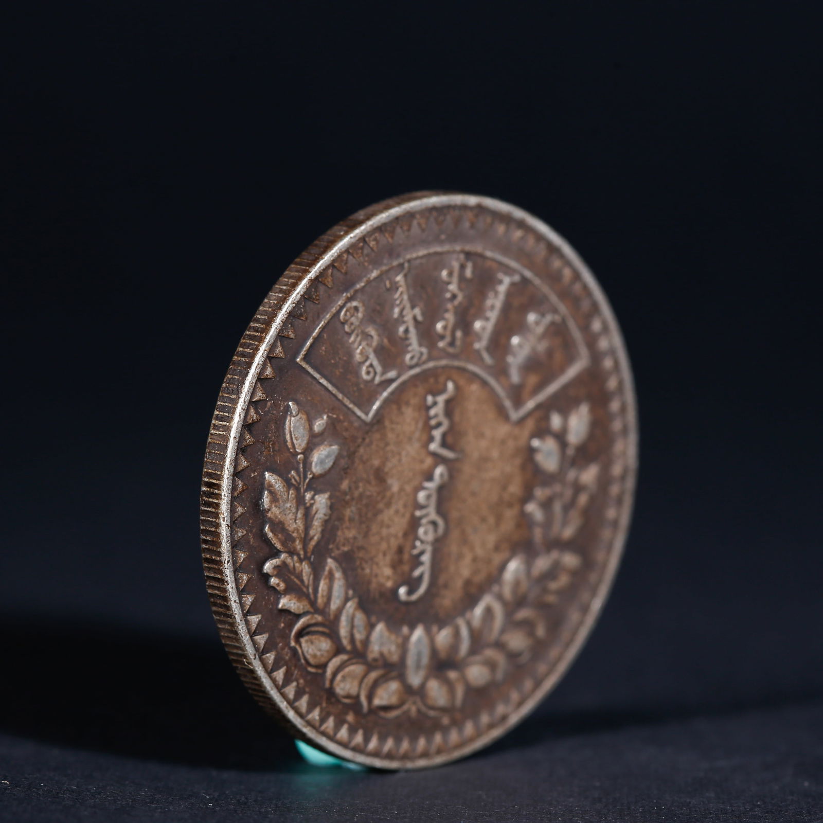 A SILVER DOLLAR COIN - 3