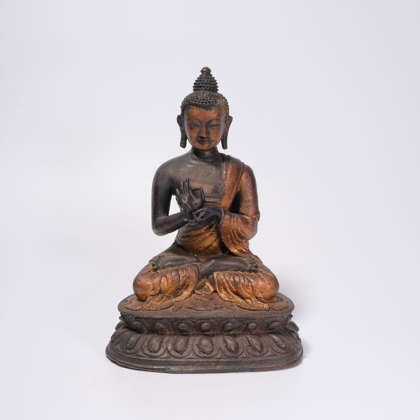 A GILDED BRONZE BUDDHA STATUE (PARTIAL) (1 of 10)