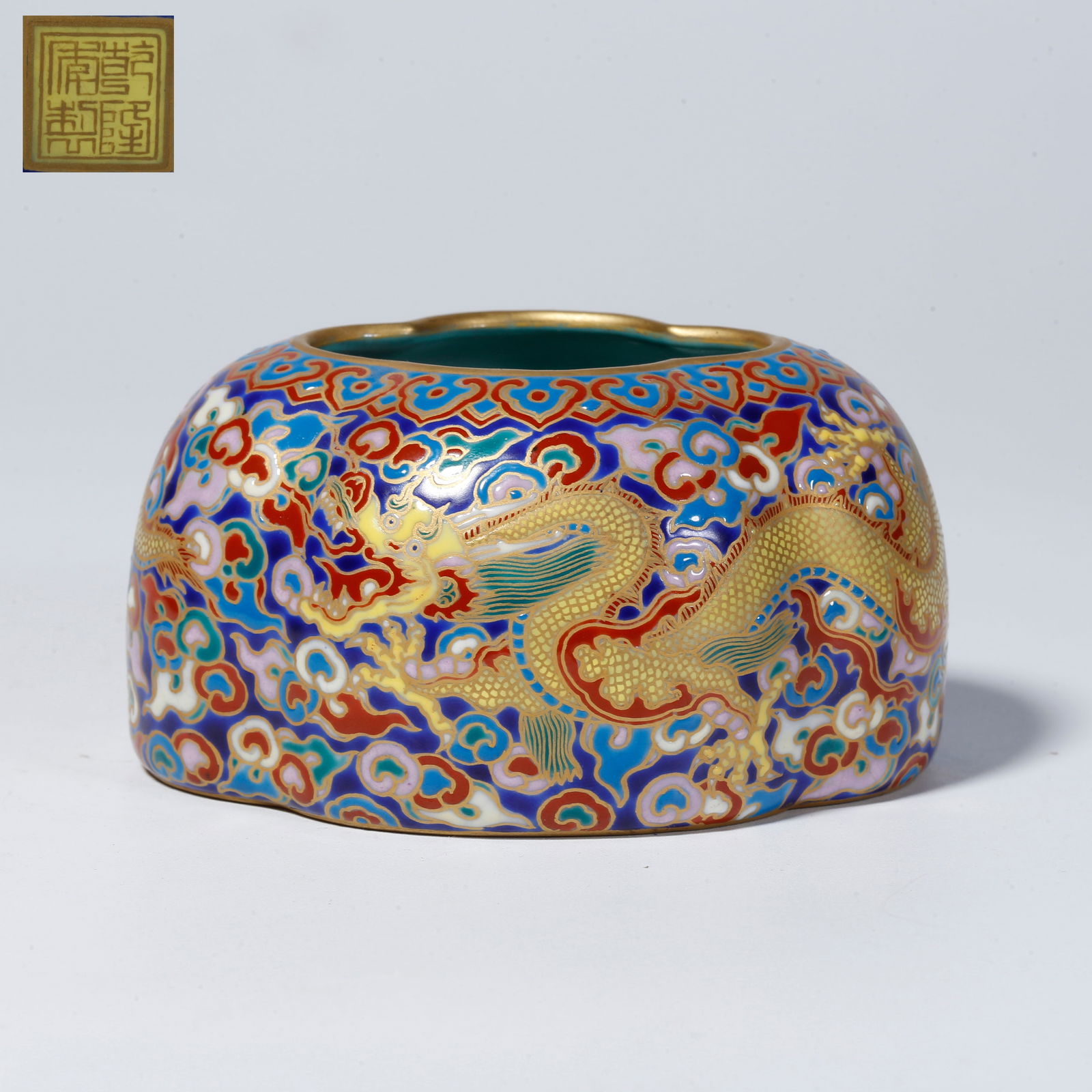 A FAMILLE-ROSE WATER POT WITH CLOUD AND DRAGON DESIGN: Famille-rose water pot with cloud and dragon design