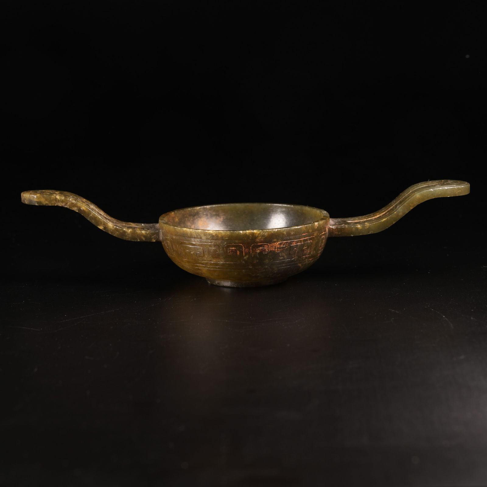 A DOUBLE-HANDLED EAR CUP IN ARCHAIC JADE: Double-Handled Ear Cup in Archaic Jade