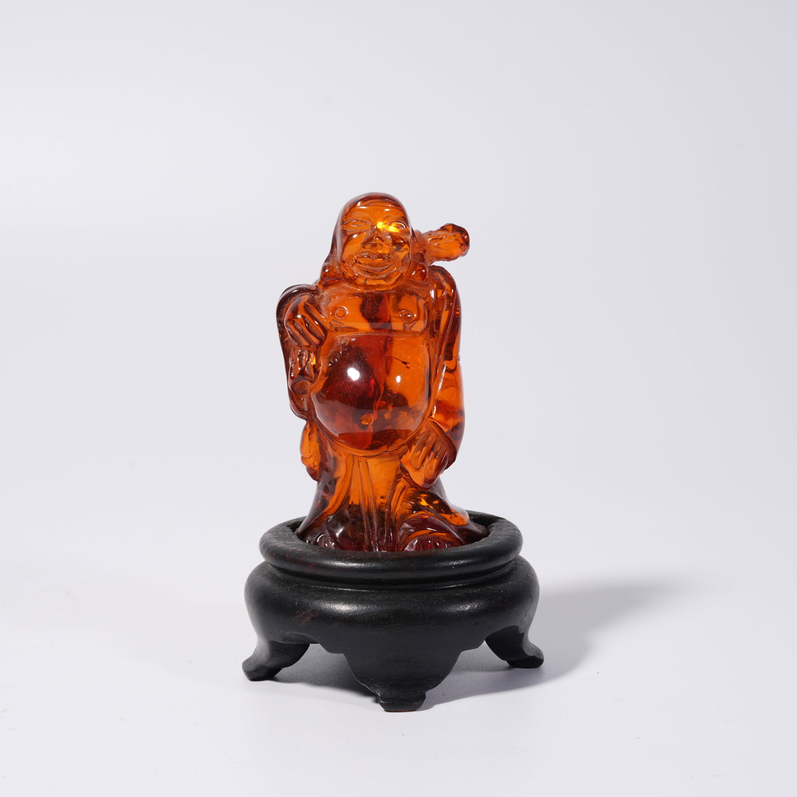 A AMBER MAITREYA BUDDHA STATUE: Amber Maitreya Buddha Statue