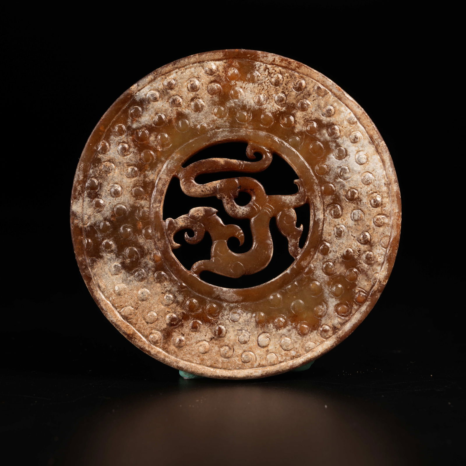 A DRAGON-PATTERN BI DISK IN ARCHAIC JADE: Dragon-Pattern Bi Disk in Archaic Jade