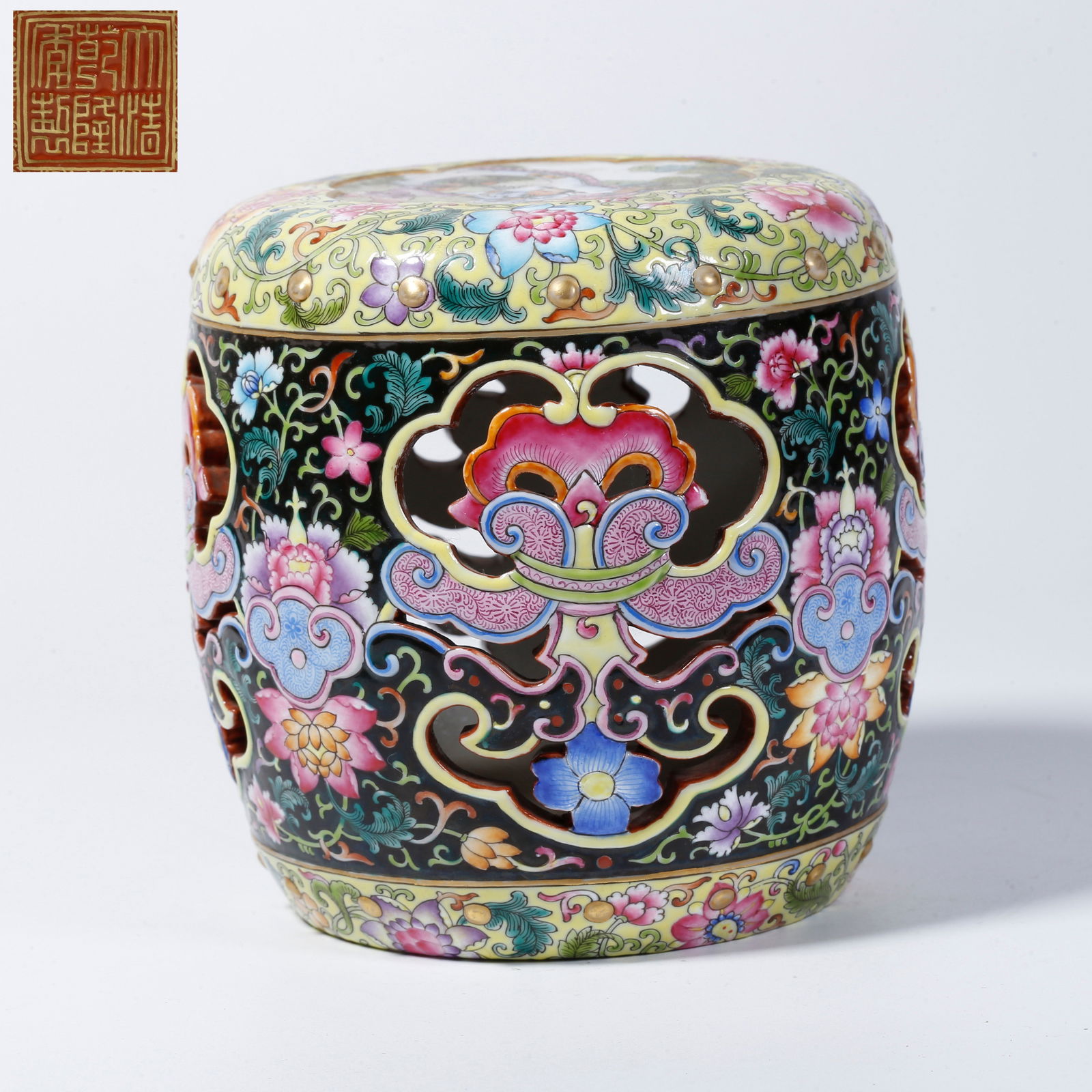 A BLACK-GROUND INCENSE BURNER WITH SCROLLING FLORAL DESIGN: Black-ground incense burner with scrolling floral design