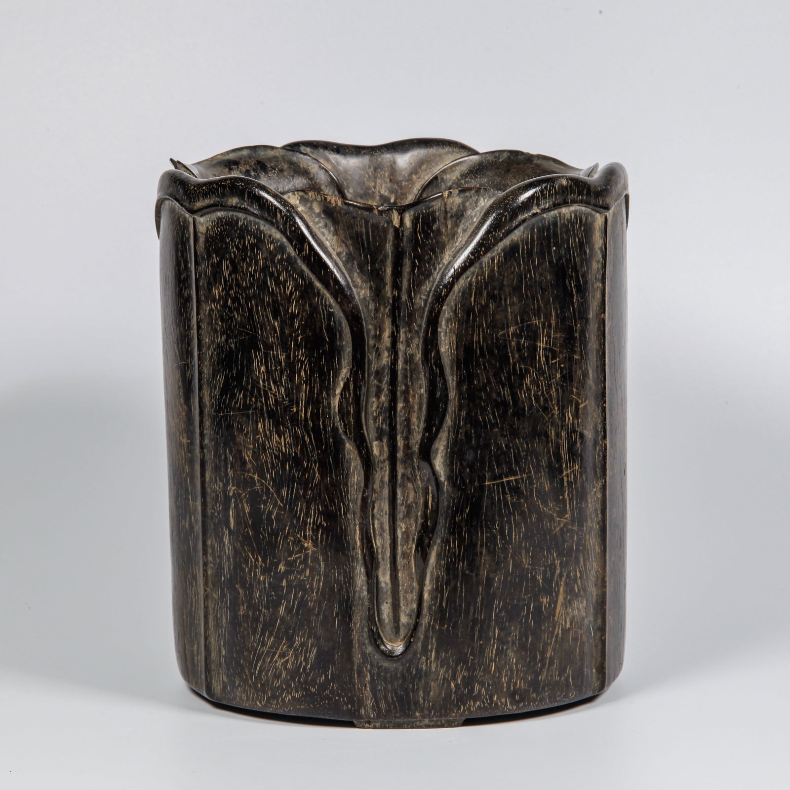 A ZITAN WOOD CARVED LOTUS-SHAPED BRUSH HOLDER: Zitan Wood Carved Lotus-Shaped Brush Holder