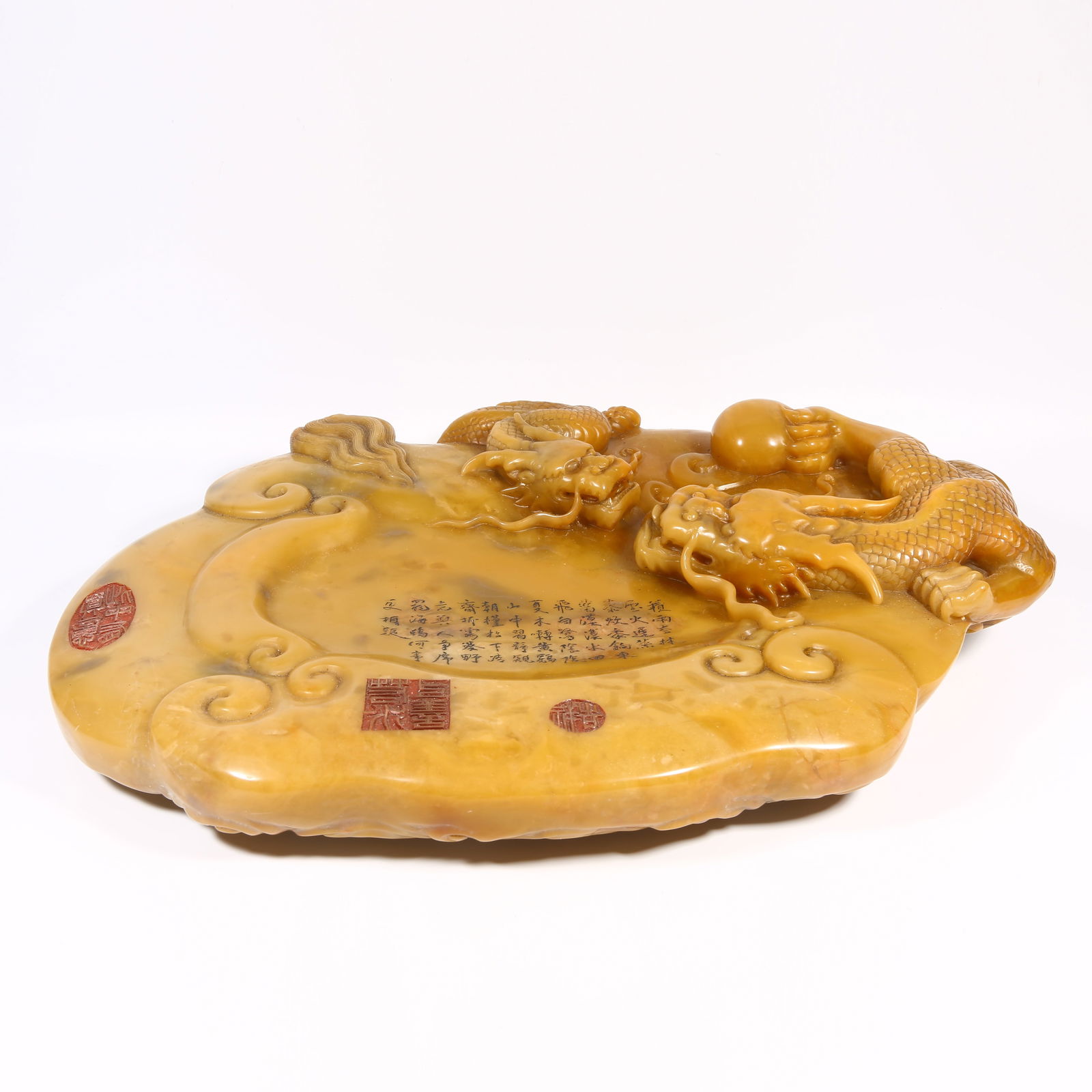 A SHOUSHAN STONE INKSTONE WITH DRAGON MOTIF: Shoushan stone inkstone with dragon motif