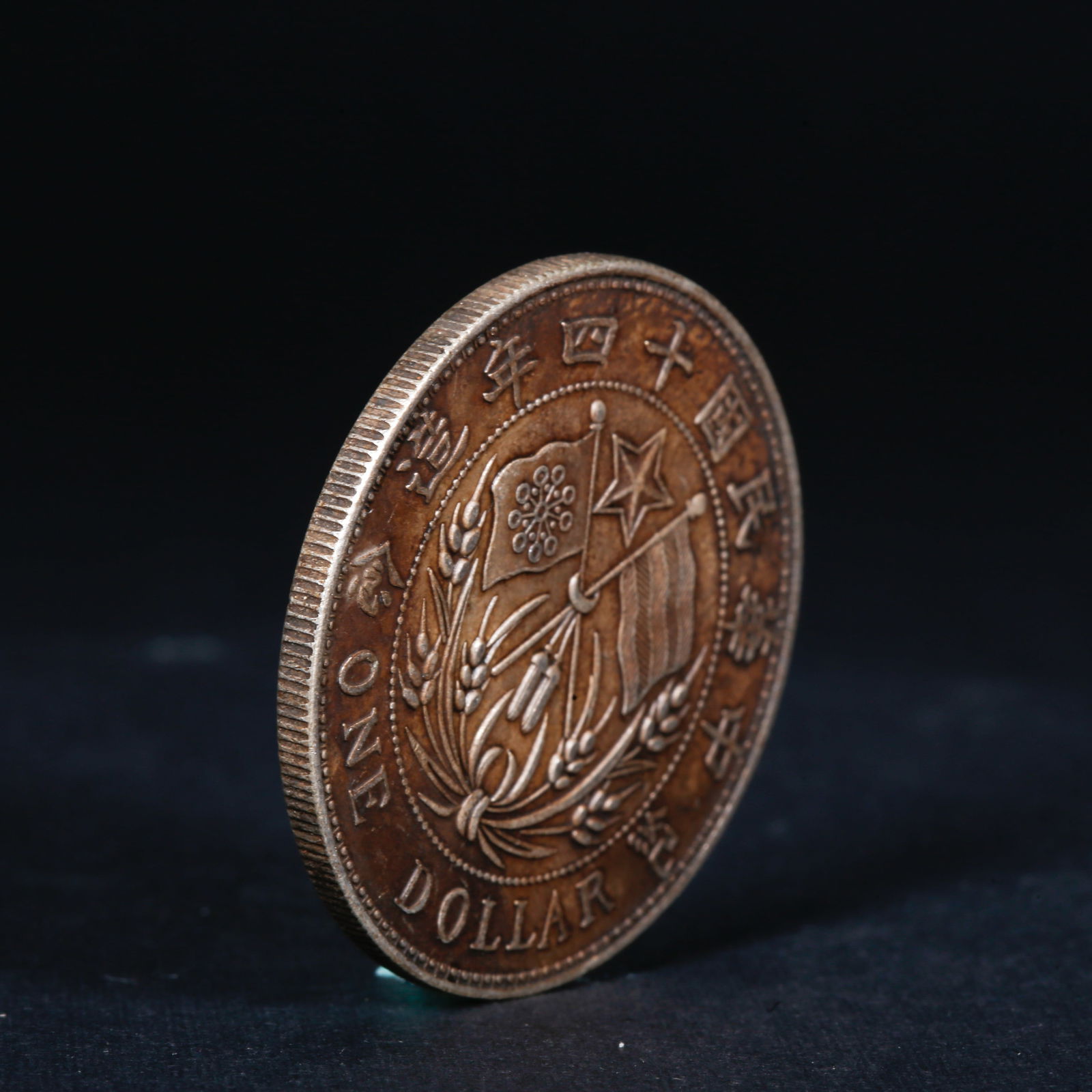 A SILVER DOLLAR COIN - 3