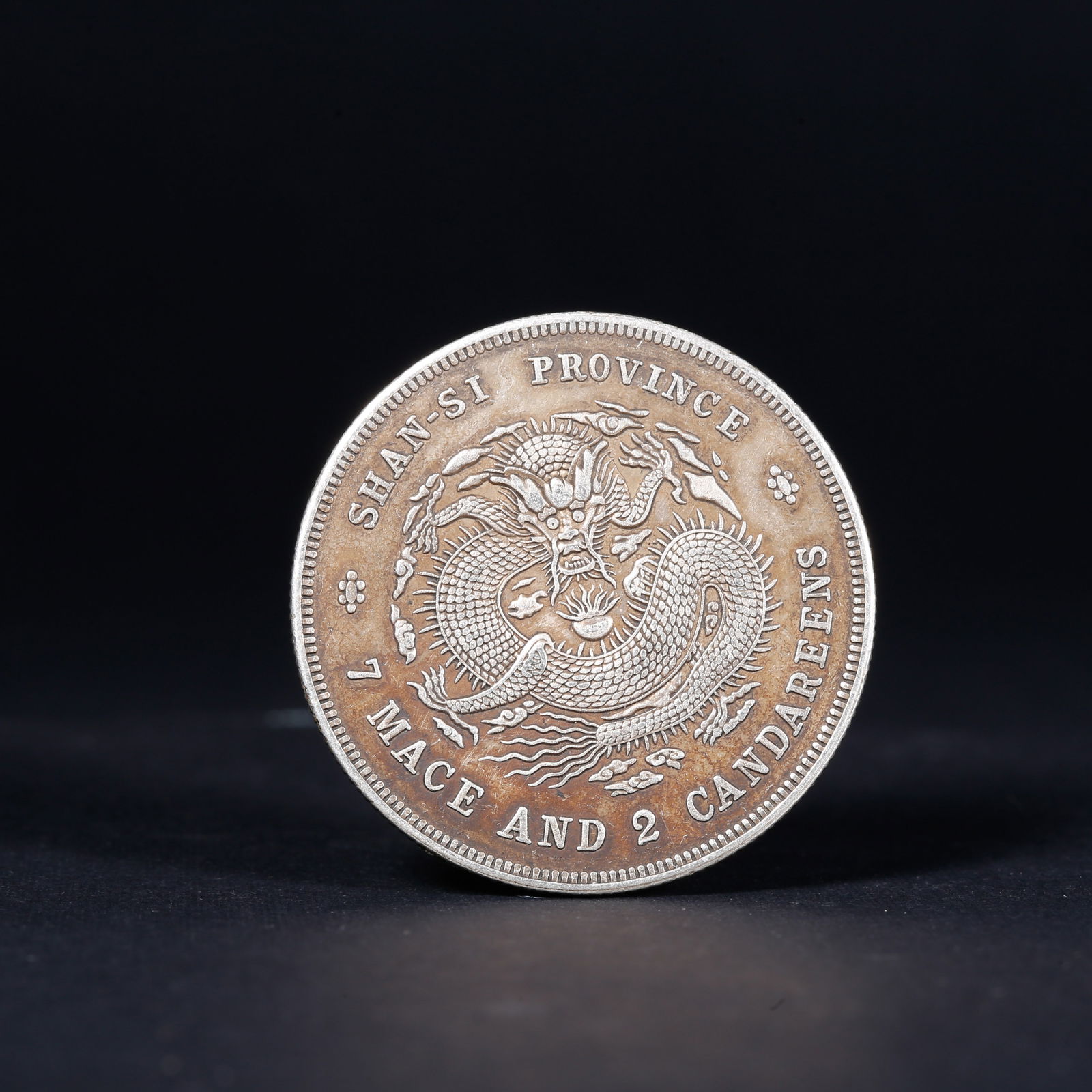 A SILVER DOLLAR COIN - 2