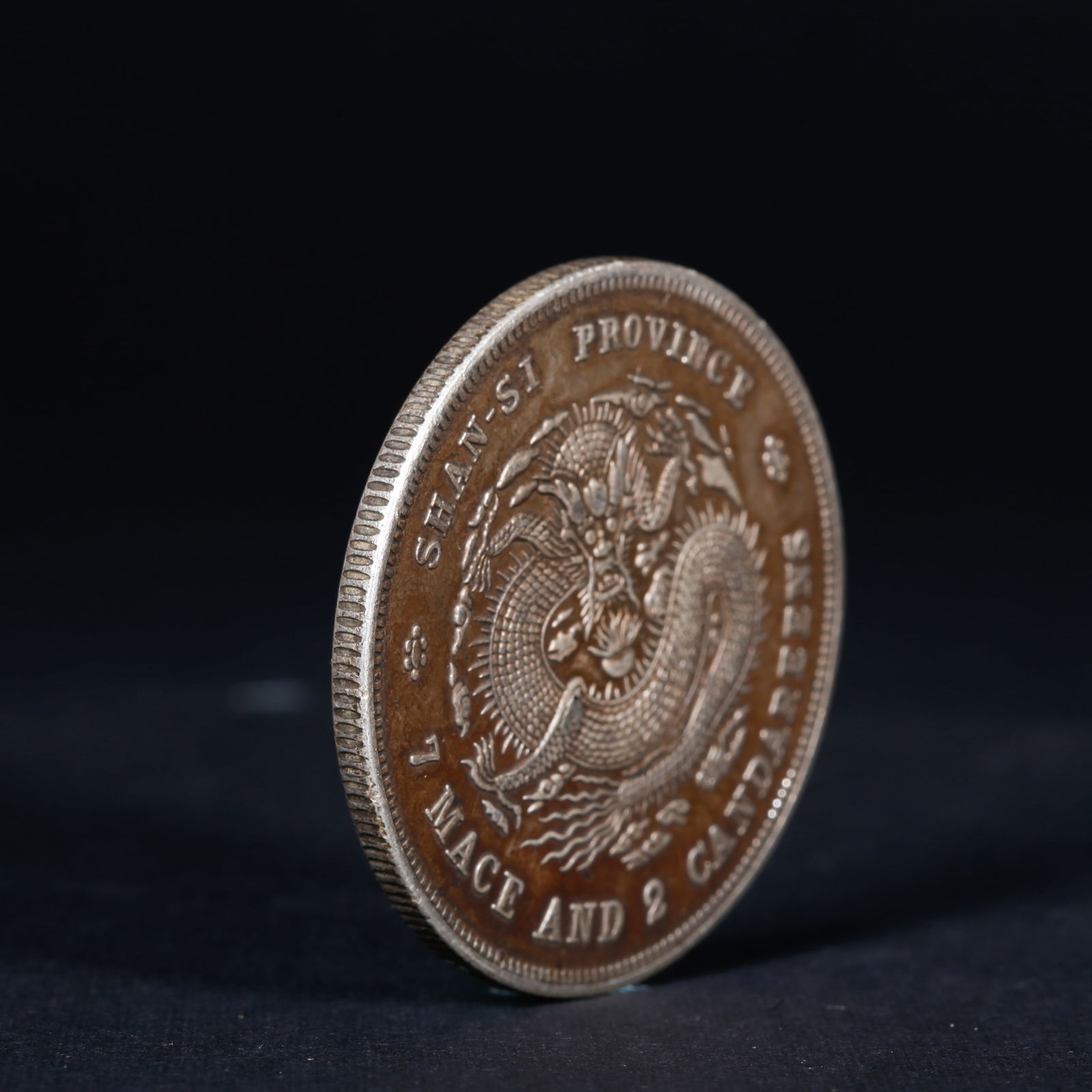 A SILVER DOLLAR COIN - 3