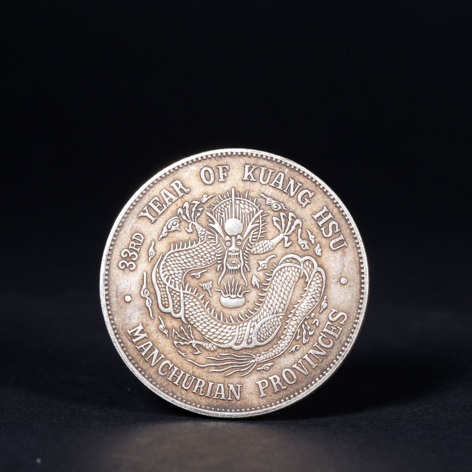 A SILVER DOLLAR COIN - 2