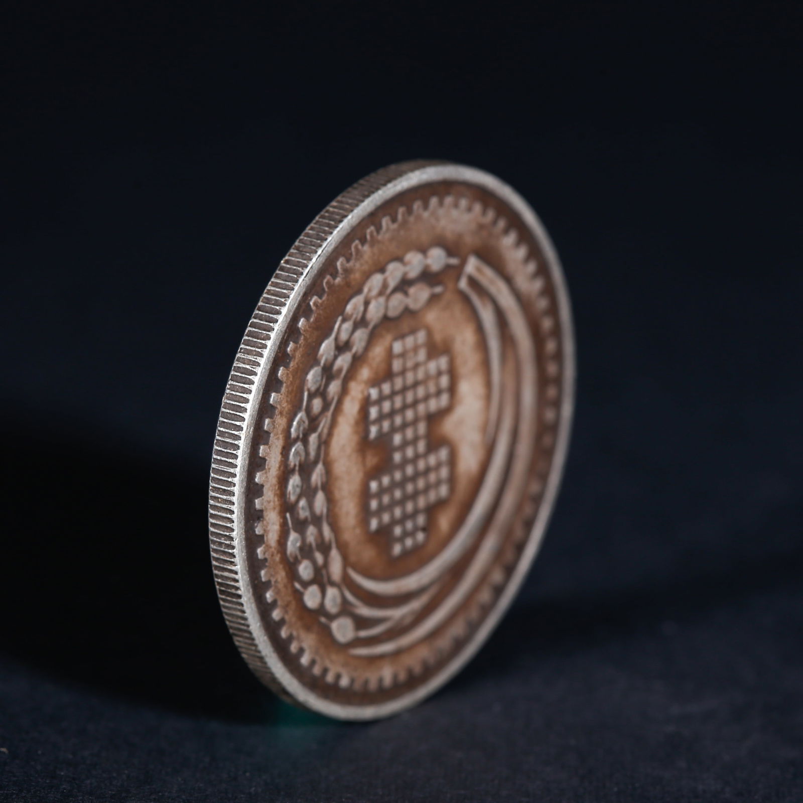 A SILVER DOLLAR COIN - 3