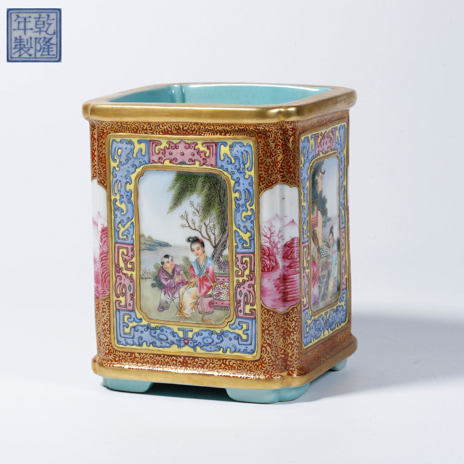 A FAMILLE ROSE BRUSH POT WITH FIGURE STORY DESIGN IN OPEN PANELS: Famille rose brush pot with figure story design in open panels