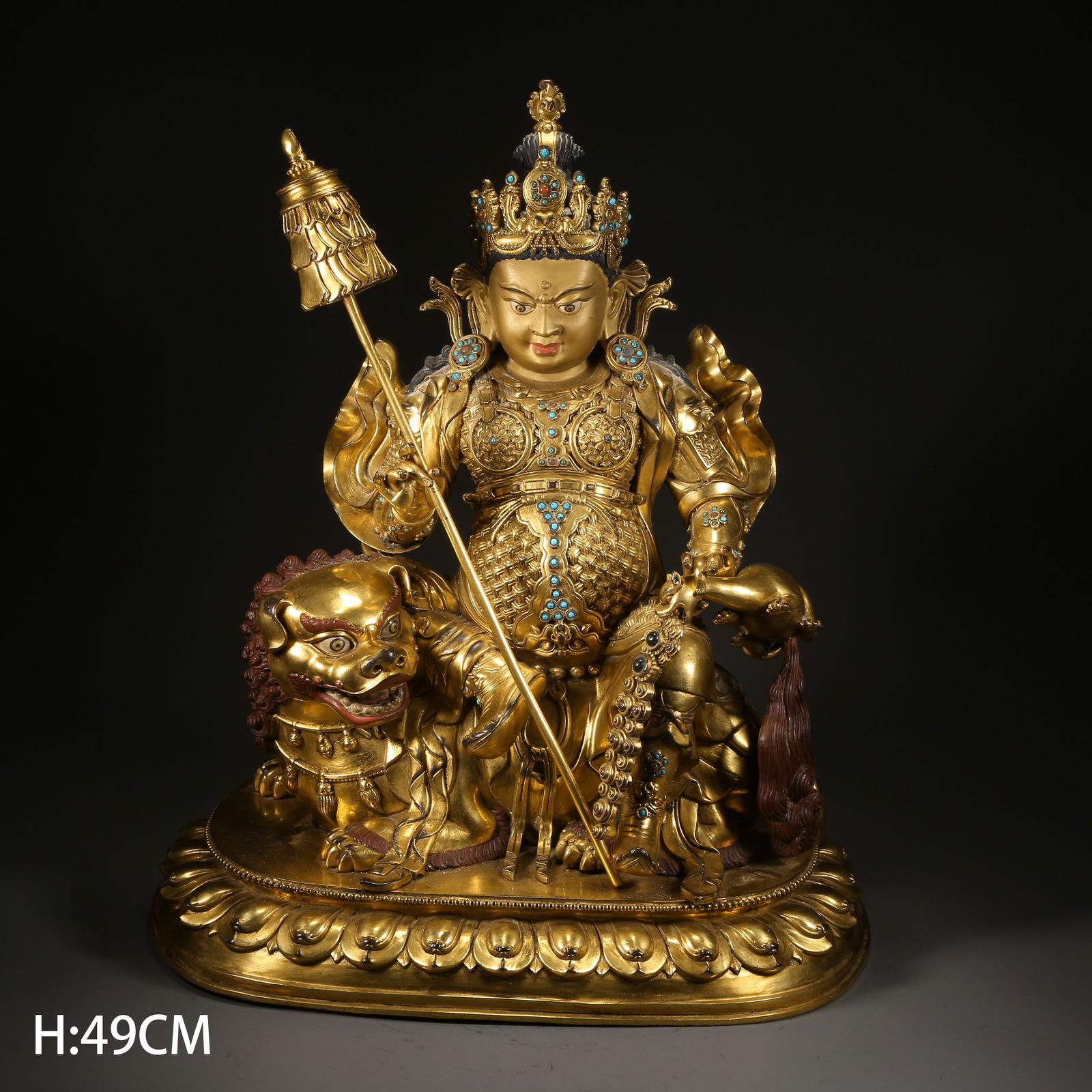 A GILDED BRONZE WEALTH KING STATUE: Gilded bronze Wealth King statue